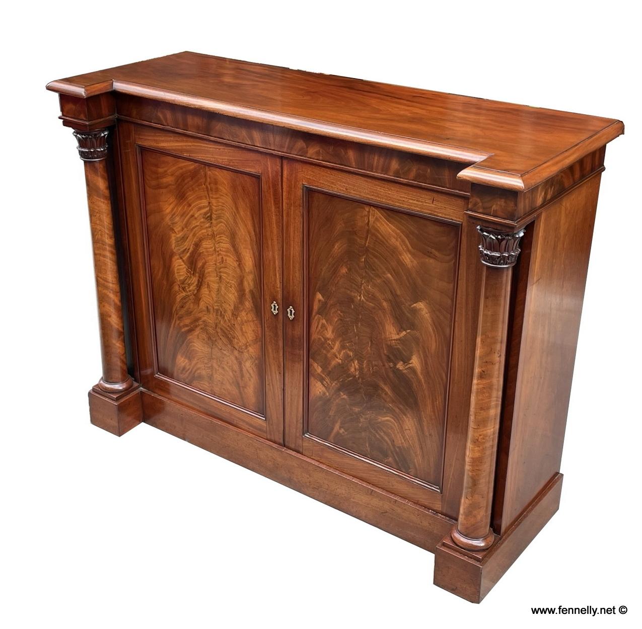 An imposing Irish flame mahogany twin door Chiffonier side cabinet of good size proportions. Made in Dublin by renowned furniture makers Mac, Williams and Gibton. Stafford Street, Dublin. First quarter of the Nineteenth Century. 

The rectangular