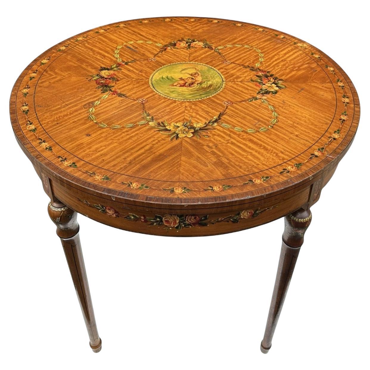 Antigua mesa auxiliar circular de madera satinada irlandesa pintada al estilo eduardiano James Hicks en venta