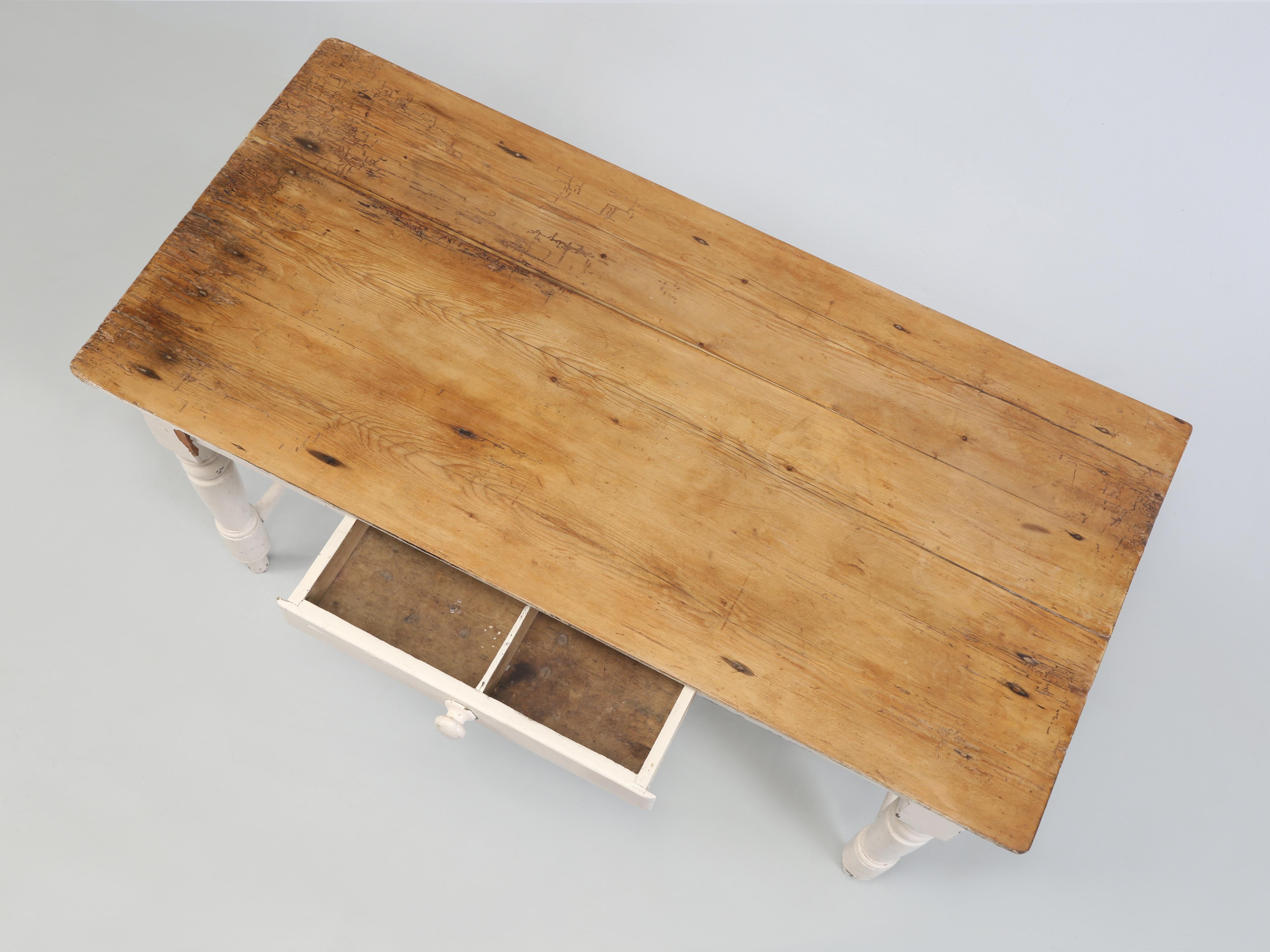 Antique Irish Pine Kitchen Table dating from around 1880-1890. The most interesting aspect of our Antique Irish Pine Small Table is the Patina of the Scrubbed Pine Top. Try as we might, there is simply no way to duplicate a real 100-year-old patina.