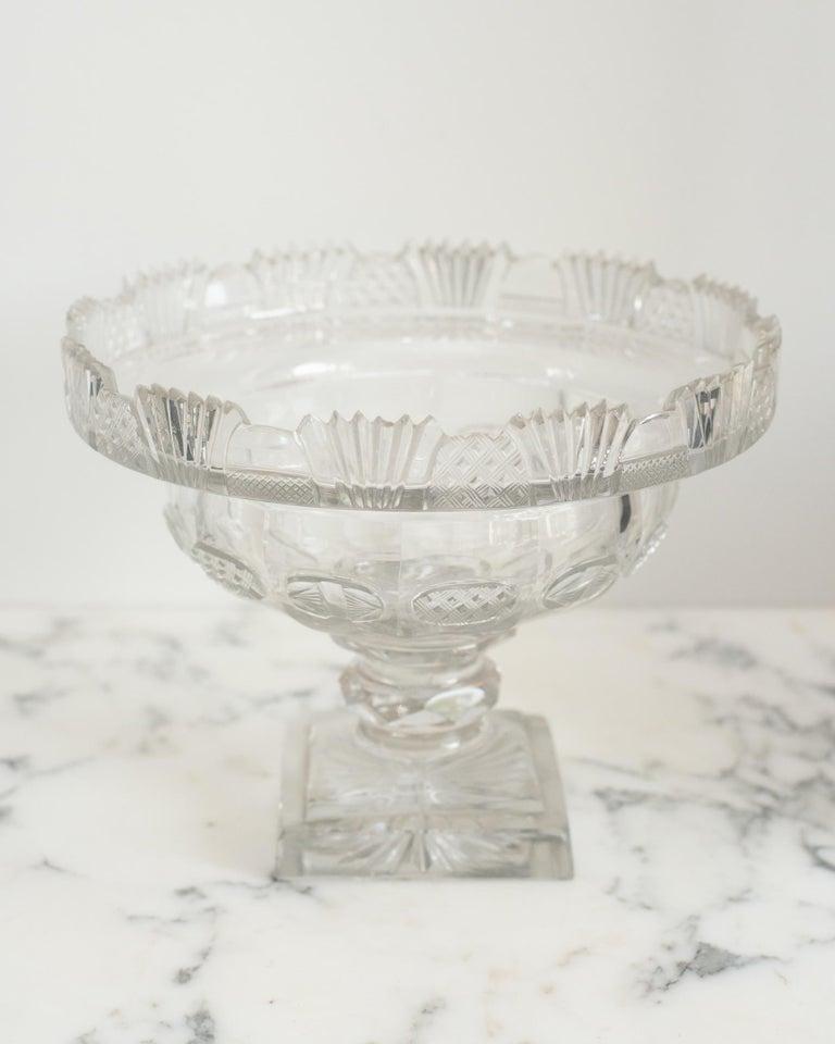 This antique Irish small cut crystal decorative bowl is a classic accessory that is easy to place in any home. Perfect for serving or decoration, it can be filled fruit or floating flowers.