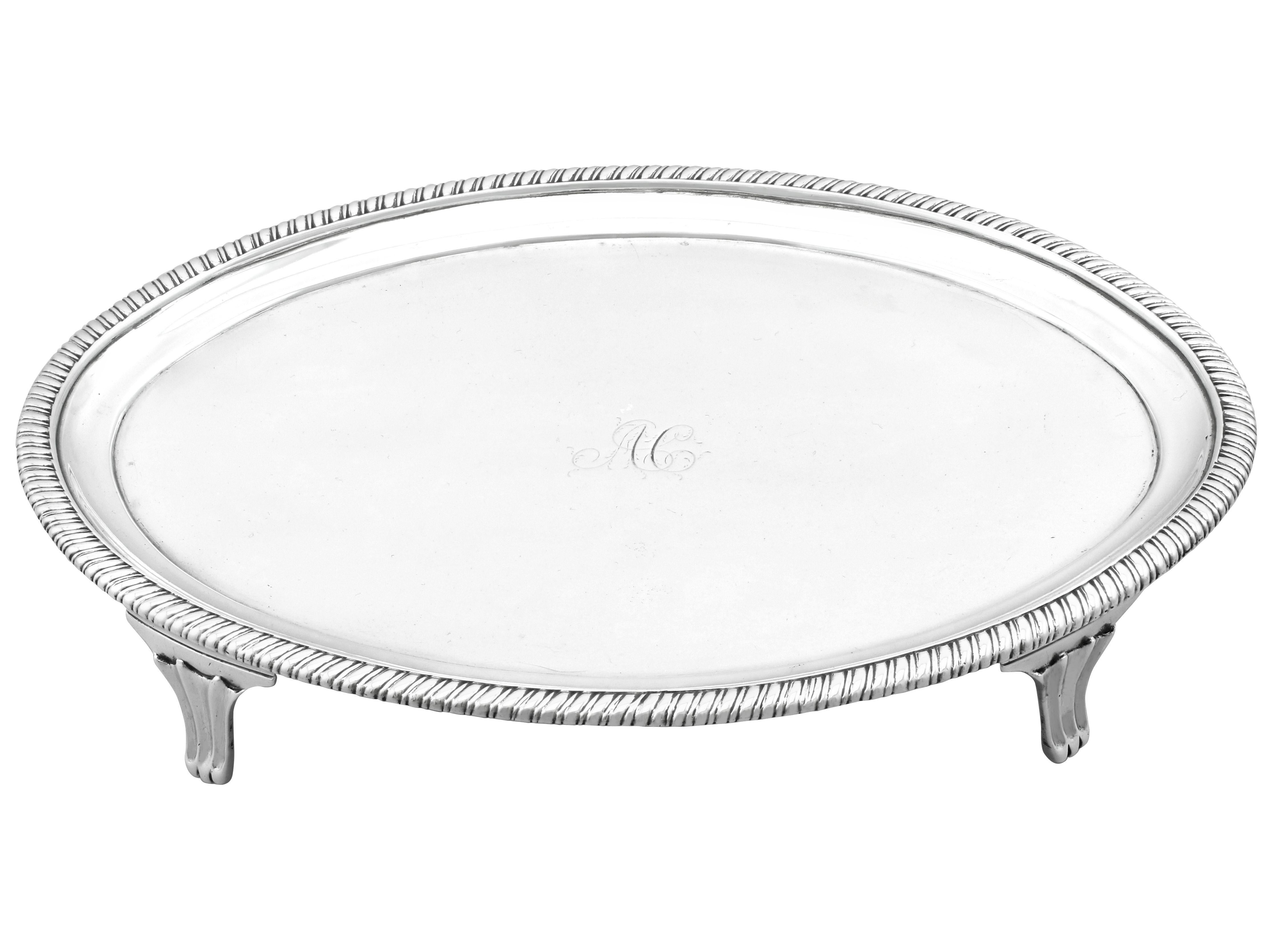 An exceptional, fine and impressive antique Georgian Irish sterling silver teapot stand/waiter; an addition to our ornamental silverware collection

This exceptional antique Georgian Irish sterling silver teapot stand/waiter has an oval