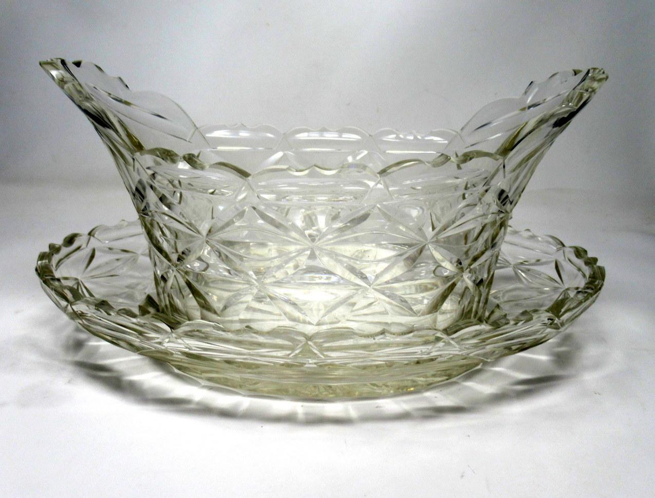 Stunning rare Irish heavy gauge handcut crystal fruit bowl of oval outline complete with original undertray, of outstanding quality and condition, circa 1800.

The unusual lobed rim above a deep cut diamond pattern with a plain oval base. The