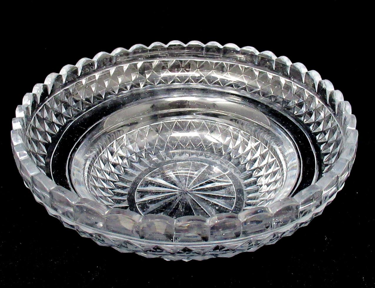 Stunning and Extremely Rare Georgian Irish Heavy Gauge Hand Cut Crystal Fruit Bowl or Centerpiece of traditional circular outline, of outstanding quality and condition. Circa 1800 - 1825. 

The unusual fan-cut decorative rim above a deep cut