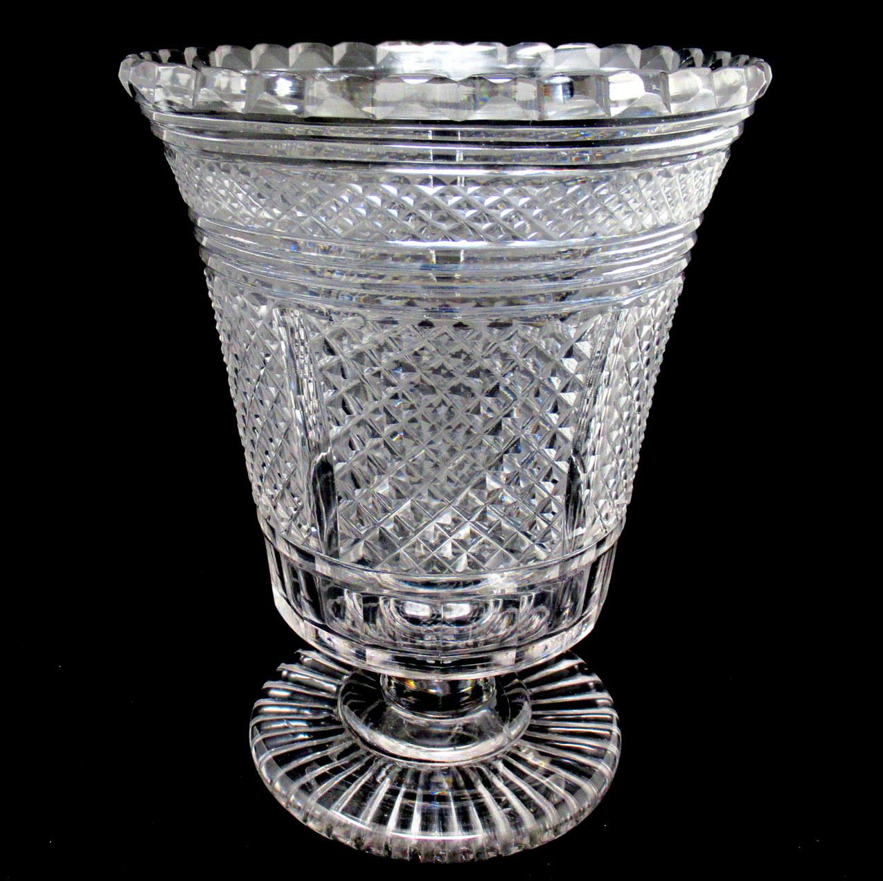 Stunning and Extremely Rare Georgian Irish Heavy Gauge hand cut crystal footed vase or centerpiece of trumpet circular outline raised on a plain socle above a circular fan cut flat base, of outstanding quality and condition. Circa 1800 - 1825.