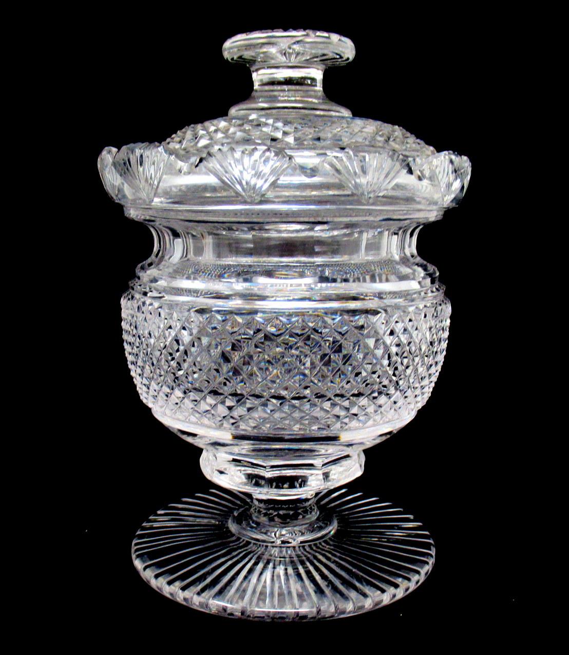 Stunning and extremely rare georgian Irish heavy gauge hand cut crystal footed lidded vase or centerpiece of bulbous circular outline raised on a plain socle above a circular fan cut flat base, of outstanding quality and condition. Circa 1800 -