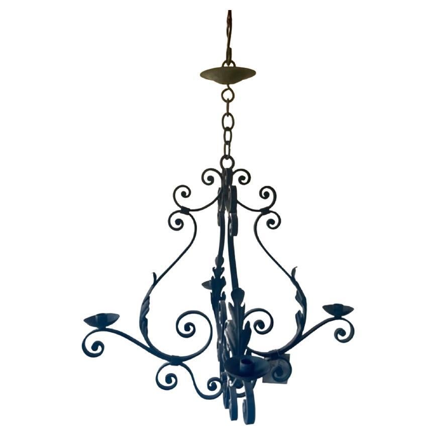 Antique Iron Candle Chandelier For Sale