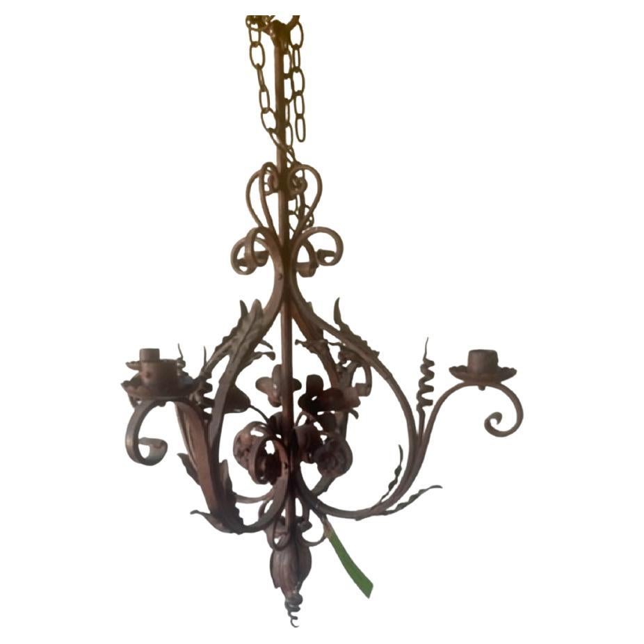 Antique Iron Candle Chandelier For Sale
