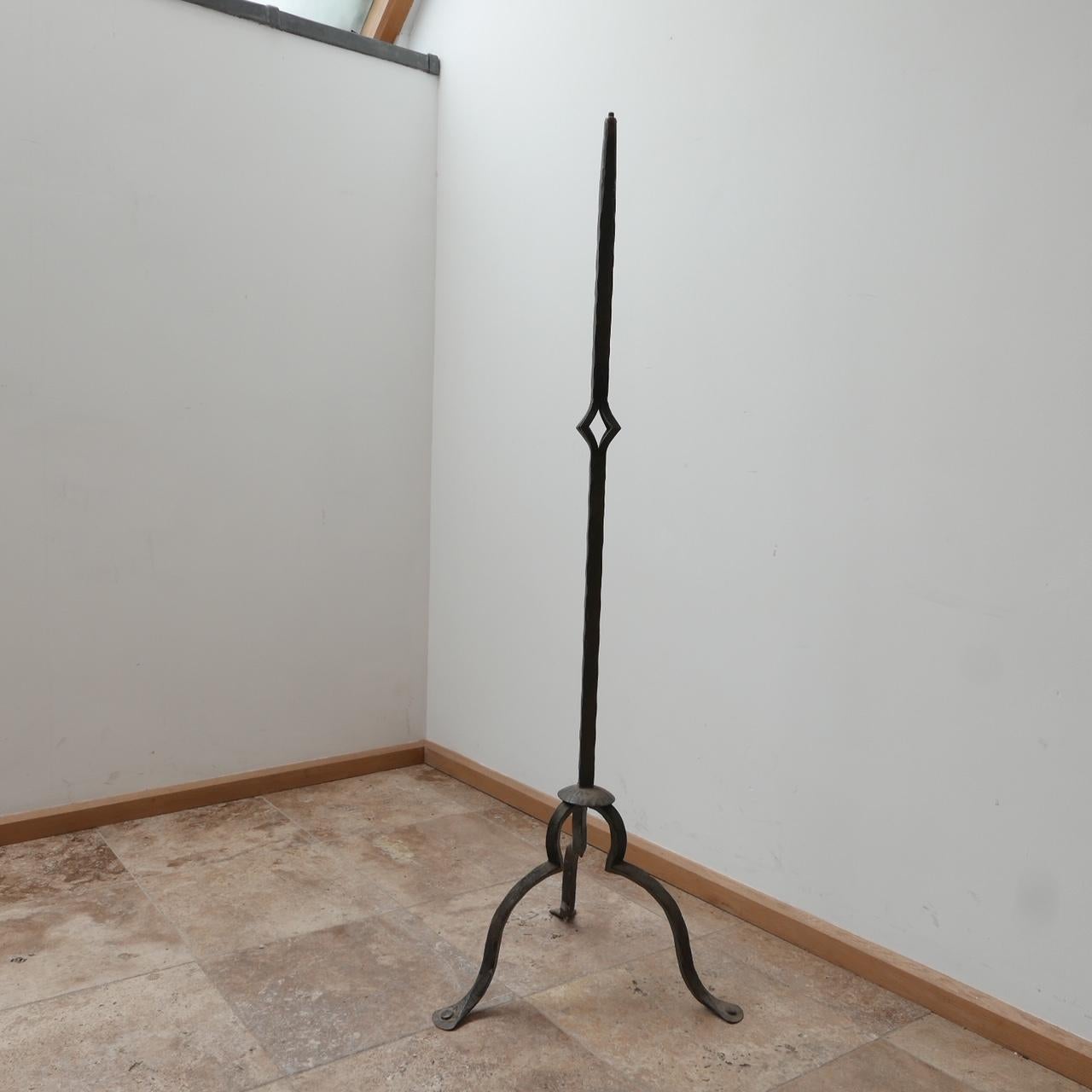 An exceptional iron floor lamp. 

Simple elegant design with three well formed legs, but the pièce de résistance is the central geometric design. 

France, c1930s. 

Immense quality. 

Since re-wired and PAT tested. 

Location: