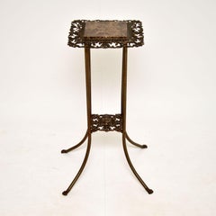 Ancienne table jardinière en fer et marbre