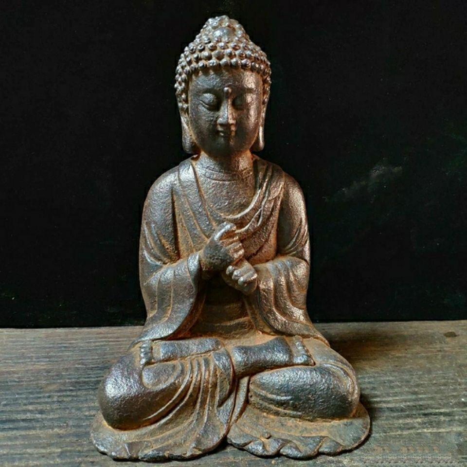 This solemn Old Iron Sitting Buddha Statue with Both Fists Together is nice and collectible.

The sitting Buddha with two fists together is a relatively uncommon but symbolically rich representation in Buddhist art. 

This pose signifies