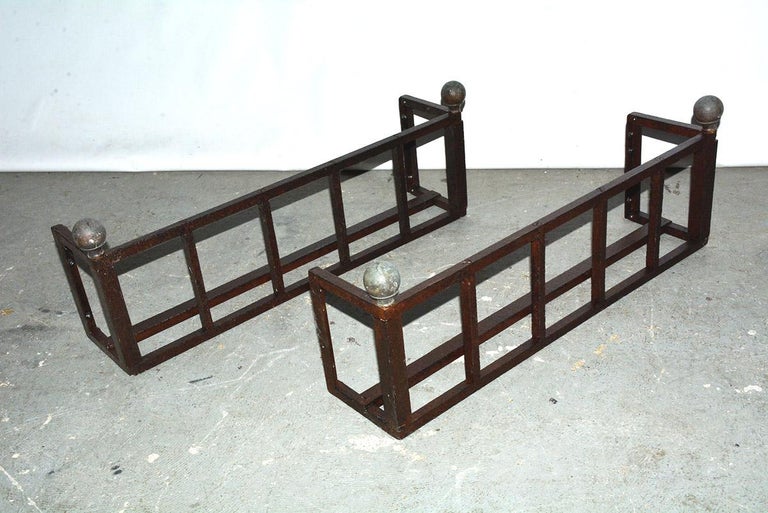 Antique architectural handwrought iron window box railings or guards are made of substantial iron bars, decorative balls top the corners. There are three holes at each end for securing the guards to building window frames. Original old beautifully