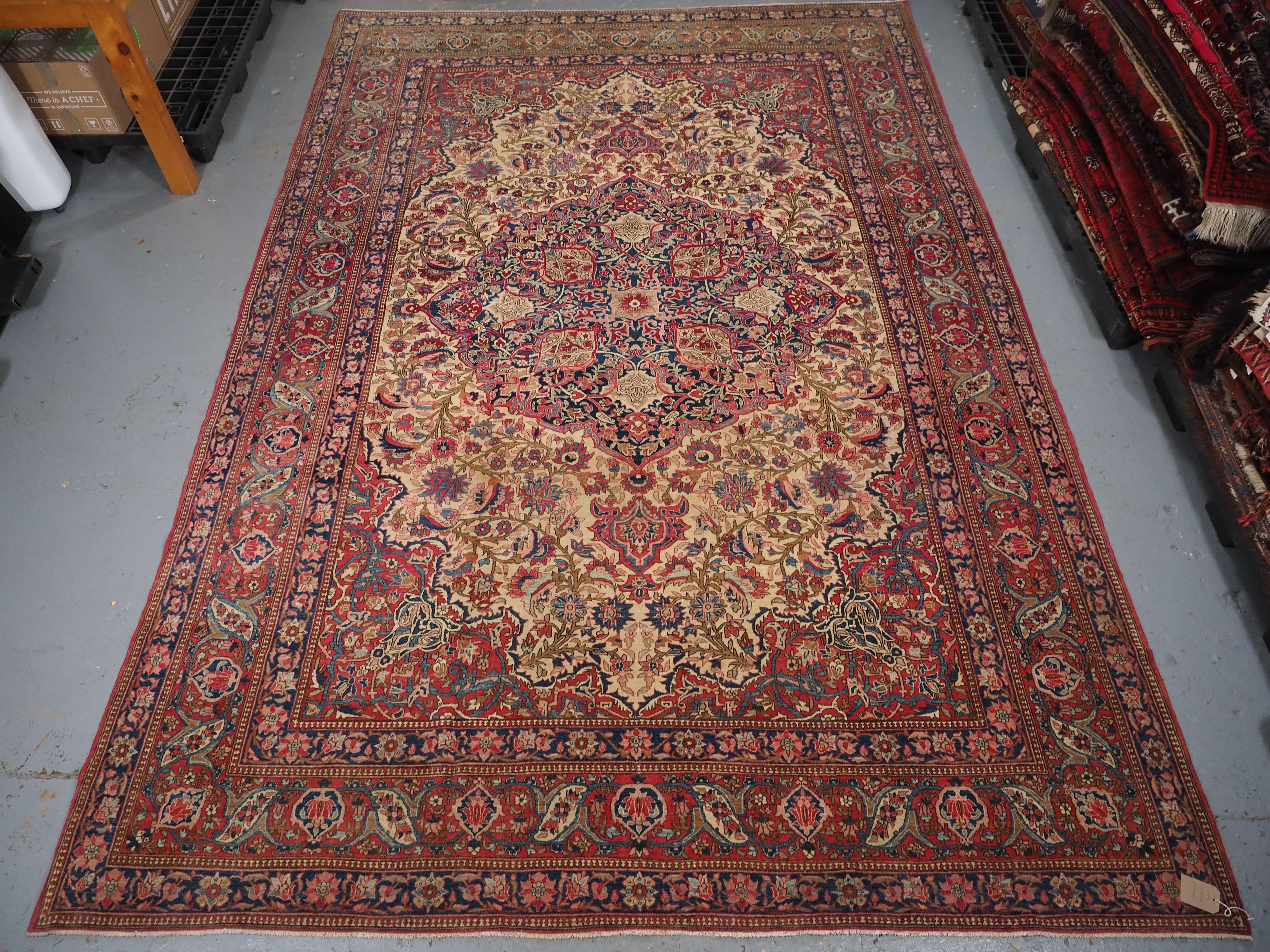 Size: 12ft 7in x 8ft 7in (383 x 262cm).

Antique Isfahan carpet of classic design, the carpet has a light camel ground with a floral design in pastel shades.

Circa 1900.

This is a really outstanding carpet of fine weave with excellent colour, the