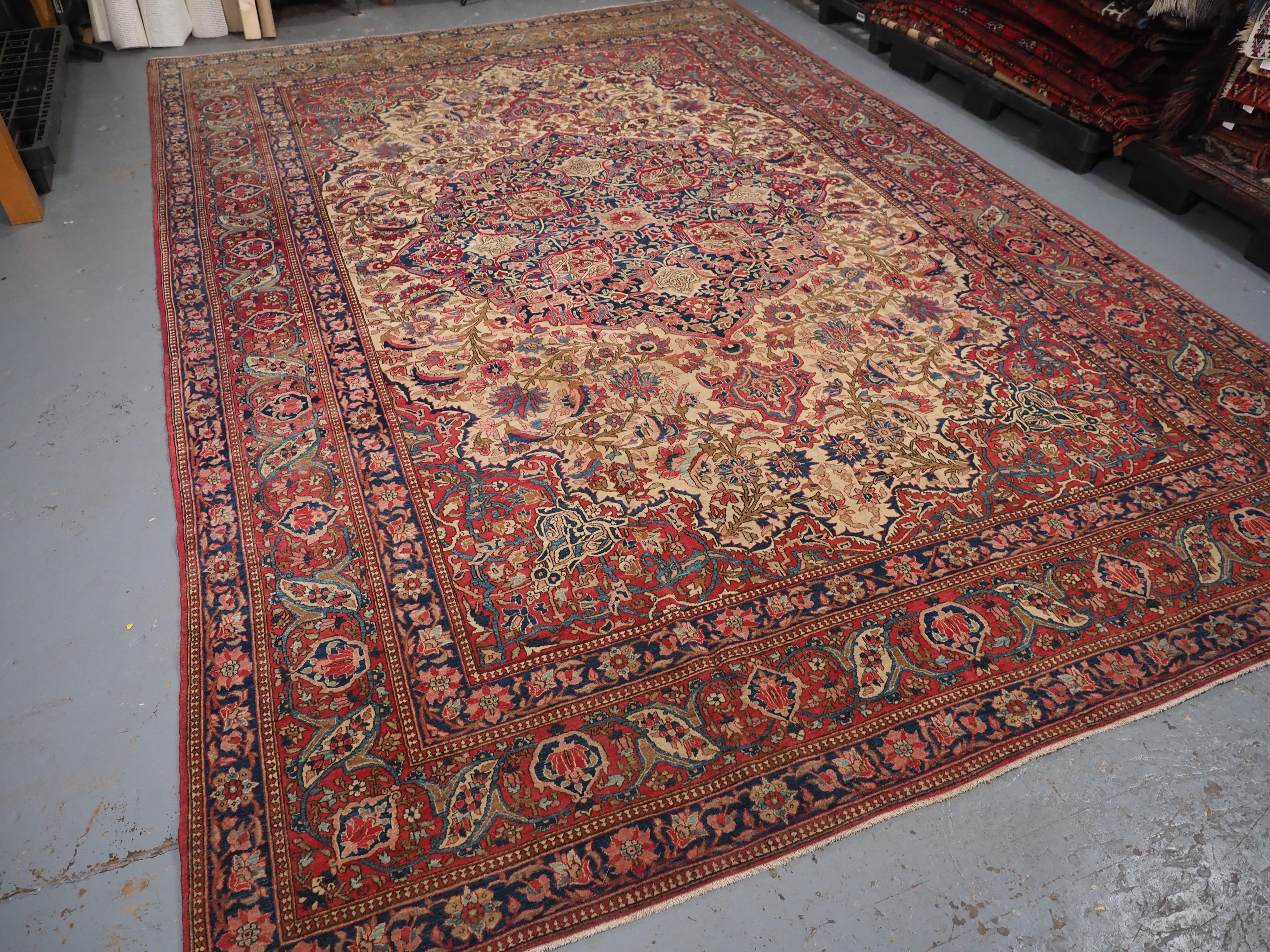 Wool Antique Isfahan carpet of classic design, with pastel shades, circa 1900. For Sale