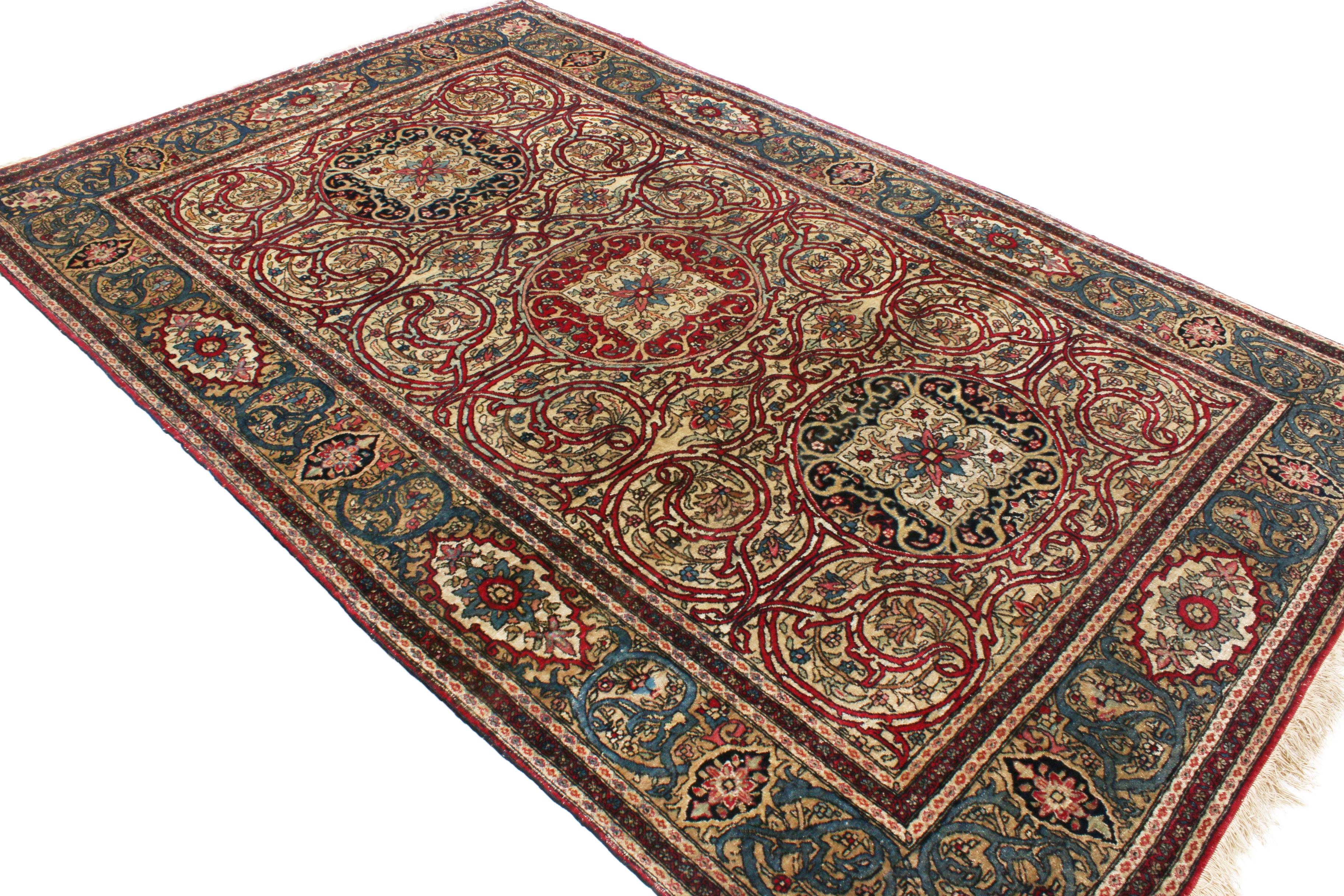 Originating from Persia between 1890-1910, this hand knotted Isfahan piece enjoys one of the most unique interpretations of the Islimi vine scroll of any Persian rug, lending a unique dimensionality to the field with the richest burgundy colourways