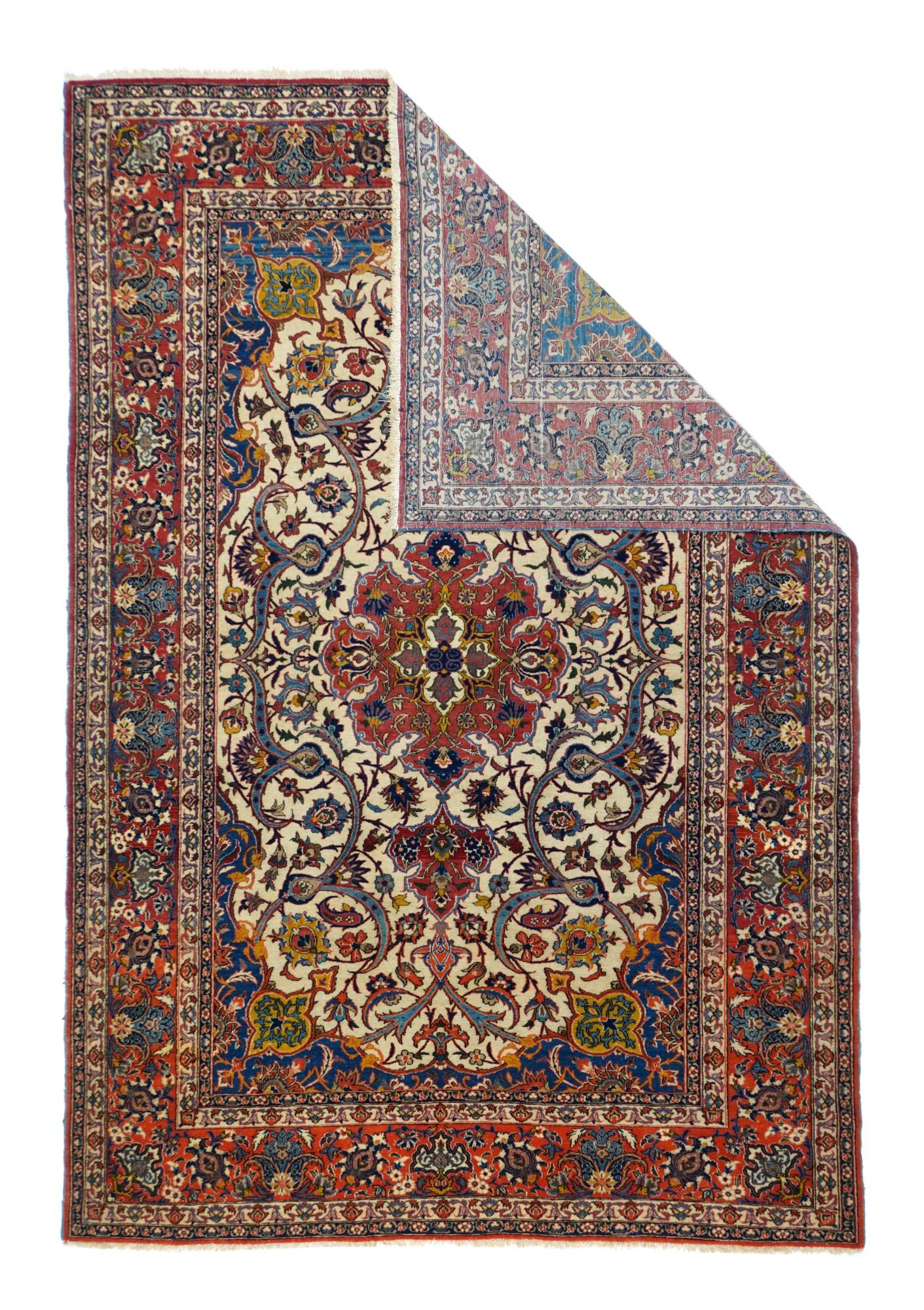 In the iconic Isfahan style, with a very fine weave of asymmetric knots on a cotton foundation, this attractive, good condition urban scatter from Central Persia shows the characteristic old ivory field with a red flaming octofoil almost round