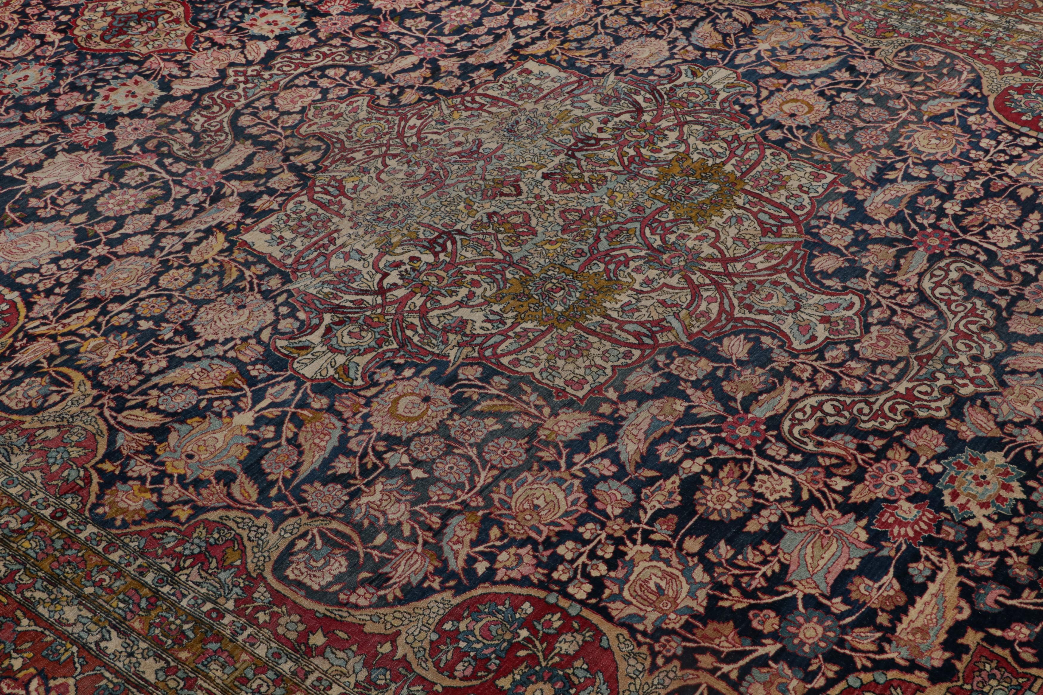 Hand-knotted in wool, originating from Persia, circa 1910-1920, this 10x13 special Isfahan rug features a medallion in primarily navy blue tones and geometric floral patterns of a particular, classic beauty. 

On the Design

A central medallion