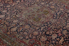 Antique Isfahan Rug in Blue with Medallion and Floral Patterns  Rug & Kilim