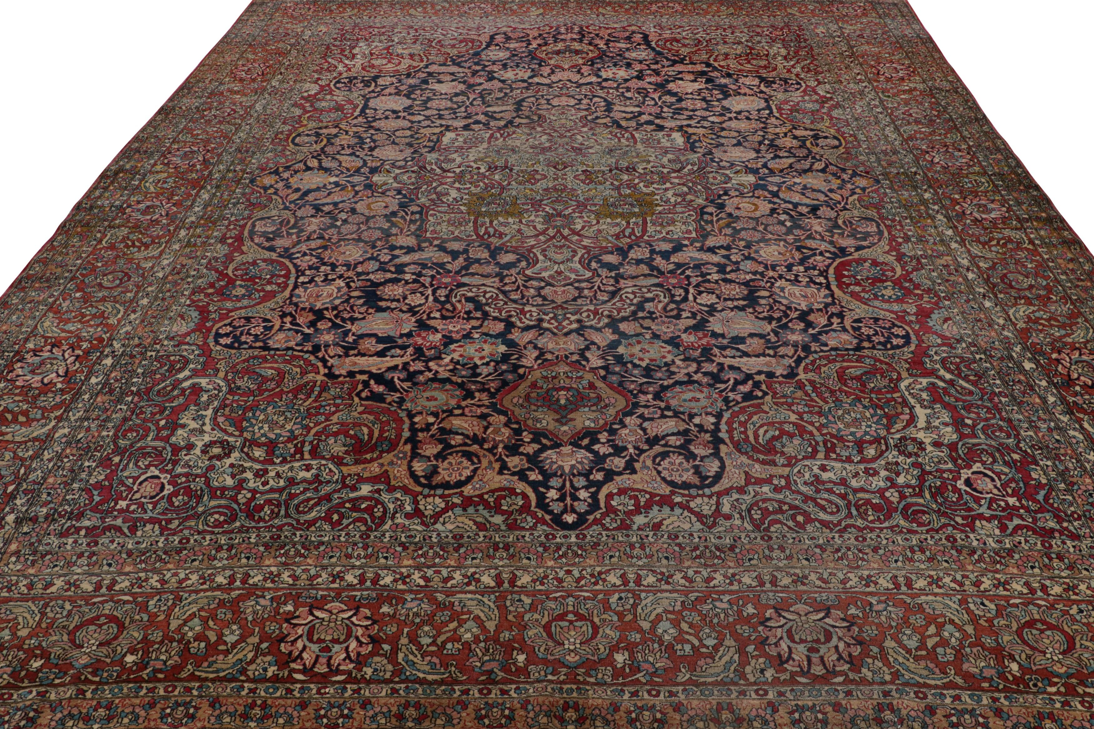 Antique Isfahan Rug in Blue with Medallion and Floral Patterns  Rug & Kilim In Good Condition For Sale In Long Island City, NY