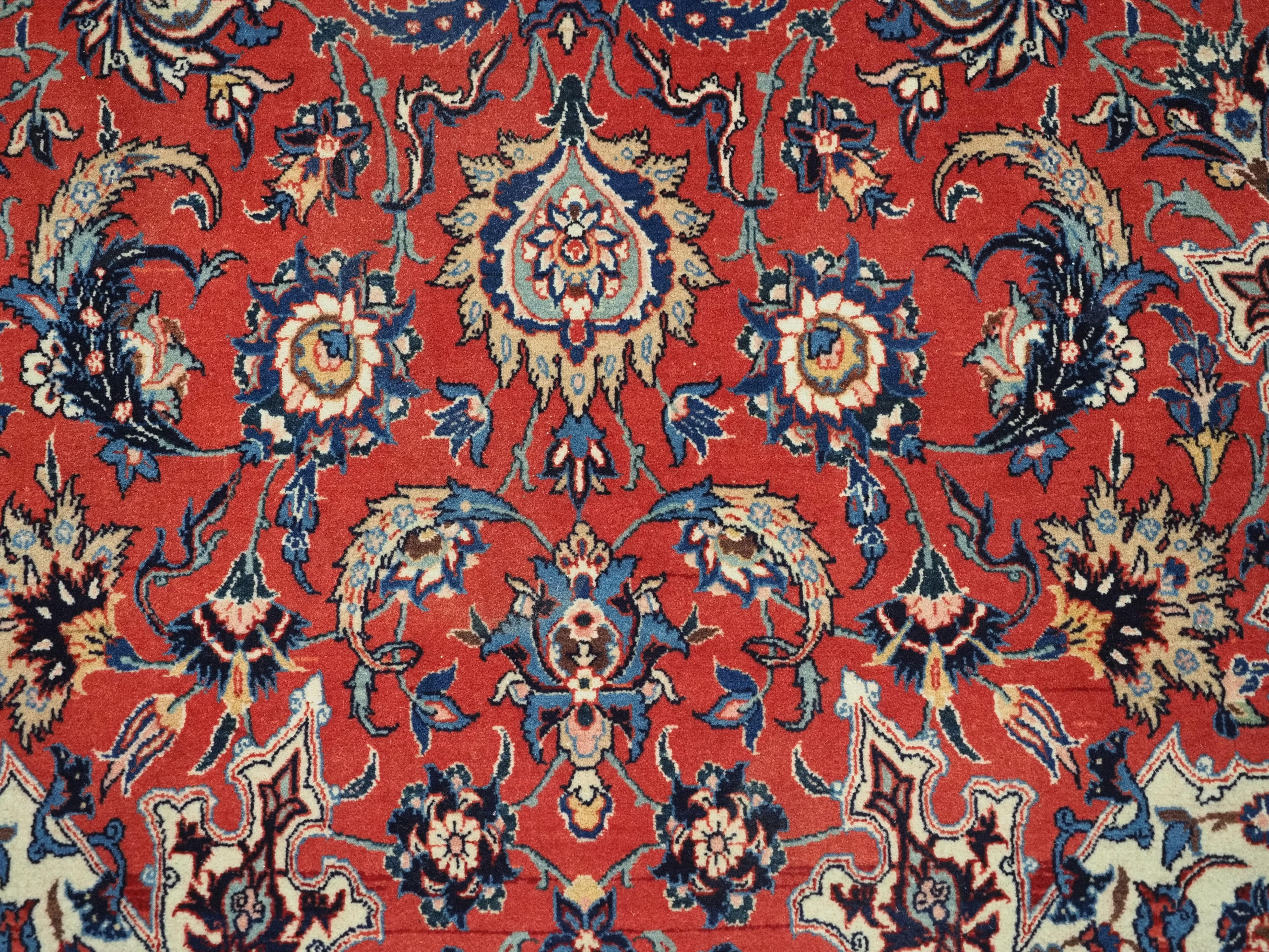 Antique Isfahan rug with all over design on warm red ground, circa 1920. For Sale 5