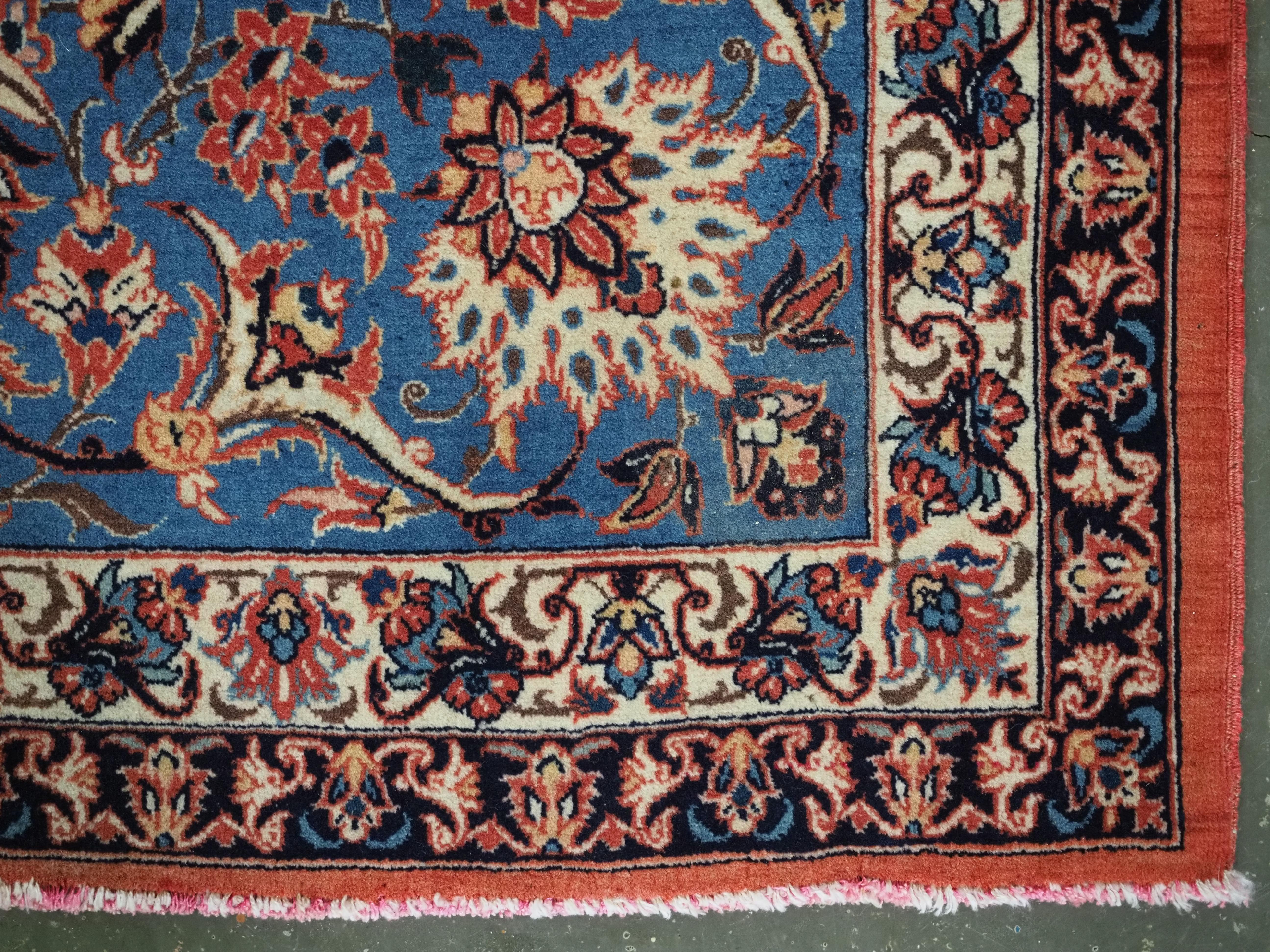 Antique Isfahan rug with all over design on warm red ground, circa 1920. For Sale 8