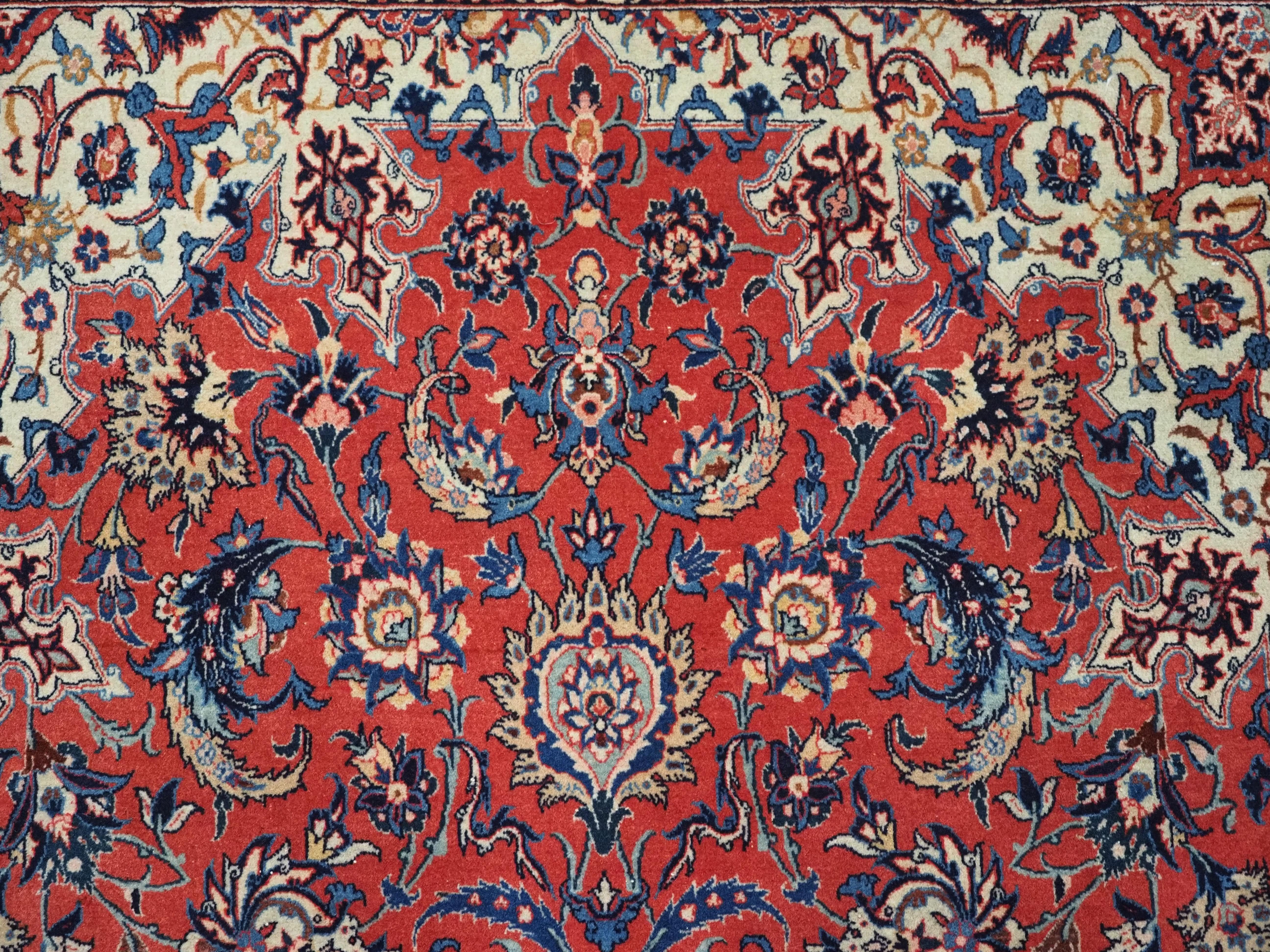Antique Isfahan rug with all over design on warm red ground, circa 1920. For Sale 3