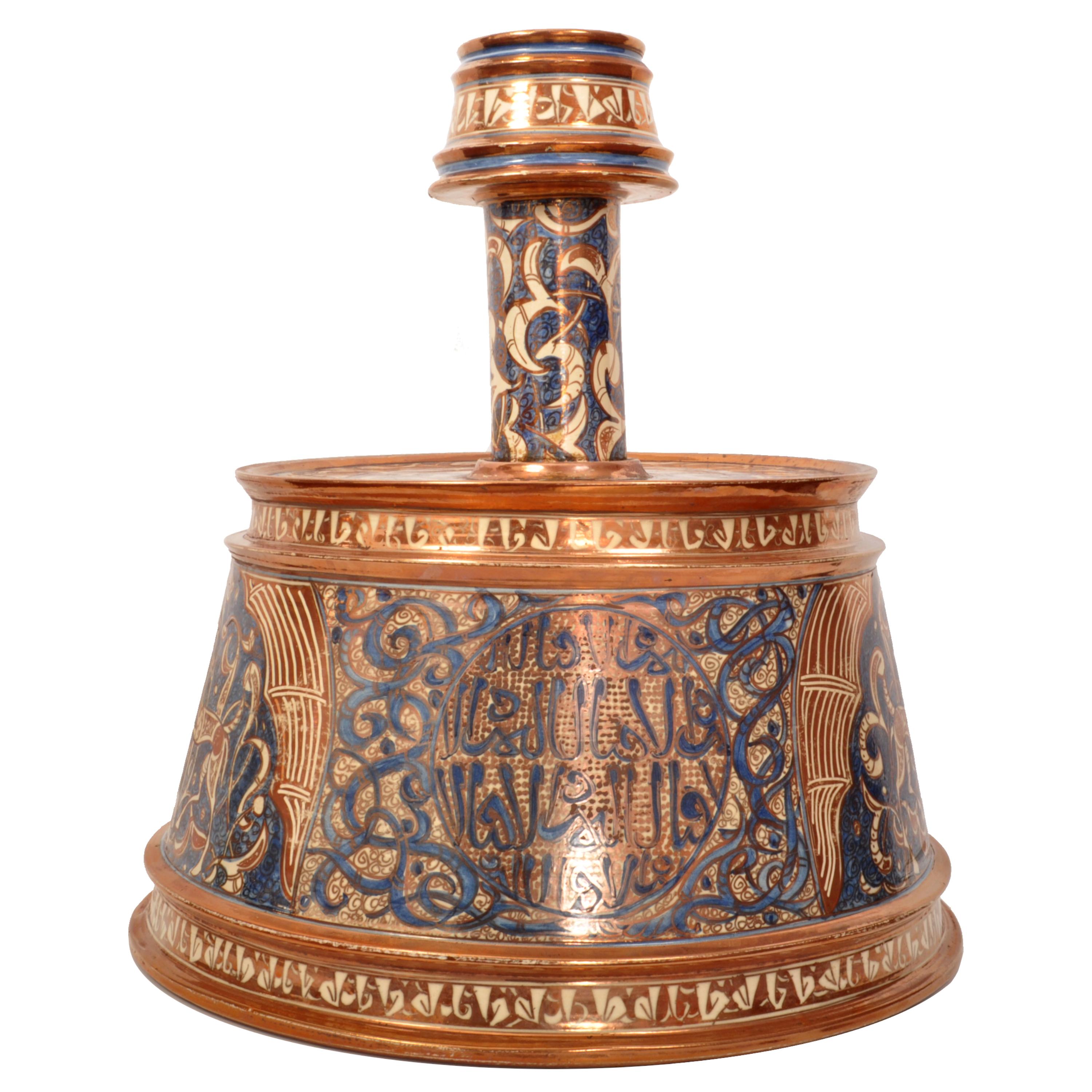 Incredibly rare/unique & monumental antique Mamluk/Nasrid Islamic pottery copper lustre candlestick, circa 1870. 
This incredible pottery candlestick follows the the form of a 14th Century Mamluk period inlaid brass candlestick from Syria. The