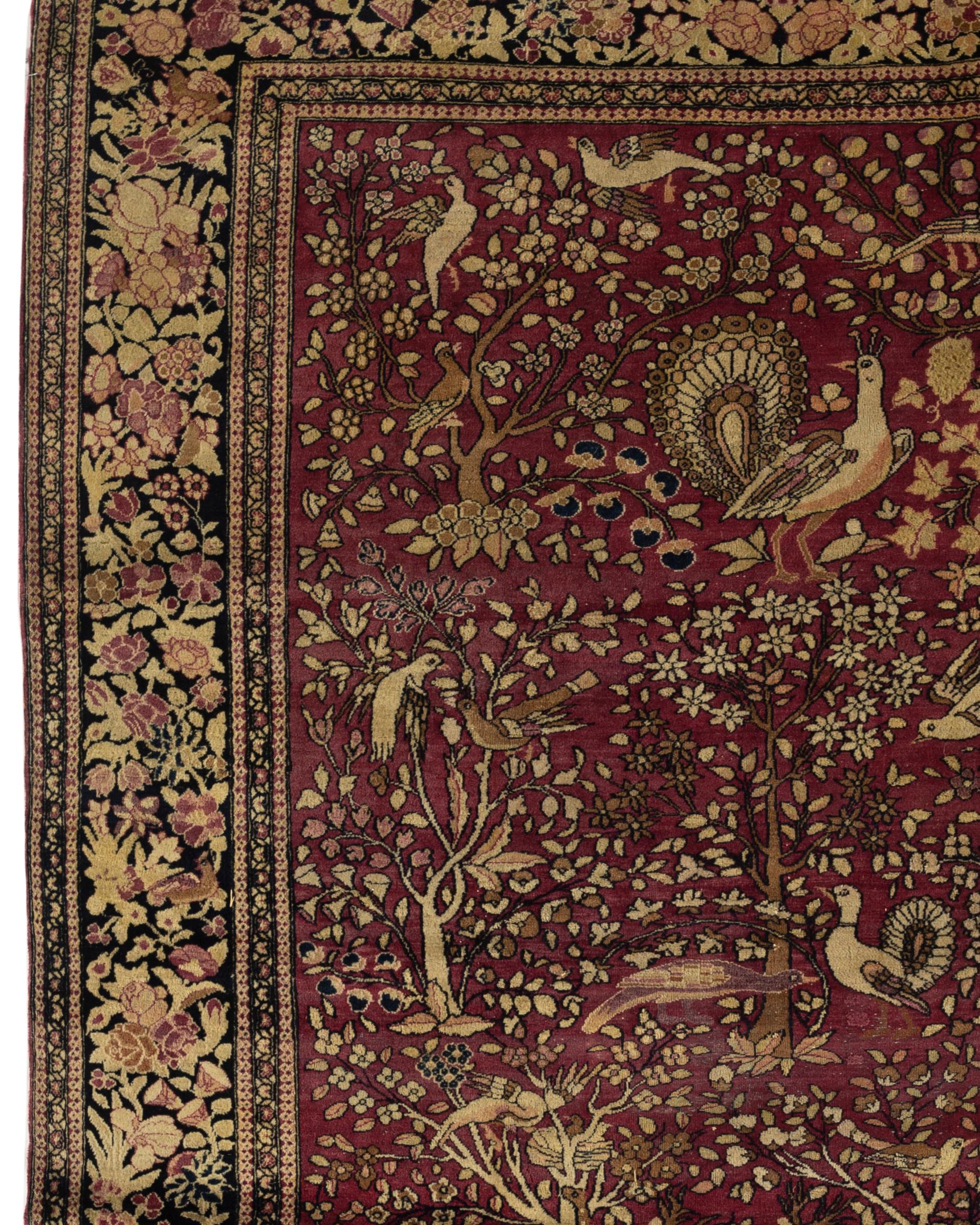 Antique Isphahan Pictorial rug, circa 1880. A delightful small pictorial rug detailing a selection of animals and birds with trees and leaves, the Elephant at the bottom of the rug with his trunk pulling on the tree with birds sitting is