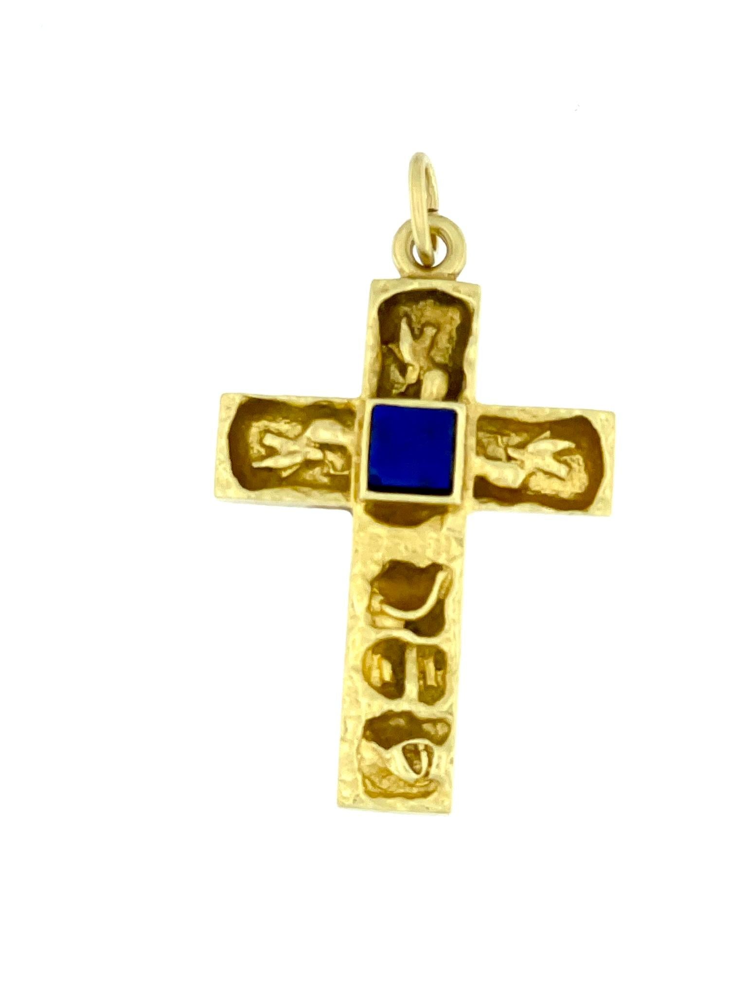 The Antique Italian 18kt Yellow Gold Cross with Lapis Lazuli is a timeless and exquisite piece of jewelry that reflects the craftsmanship and artistry of Italian design. The use of 18-karat yellow gold adds a touch of luxury and warmth to the cross.