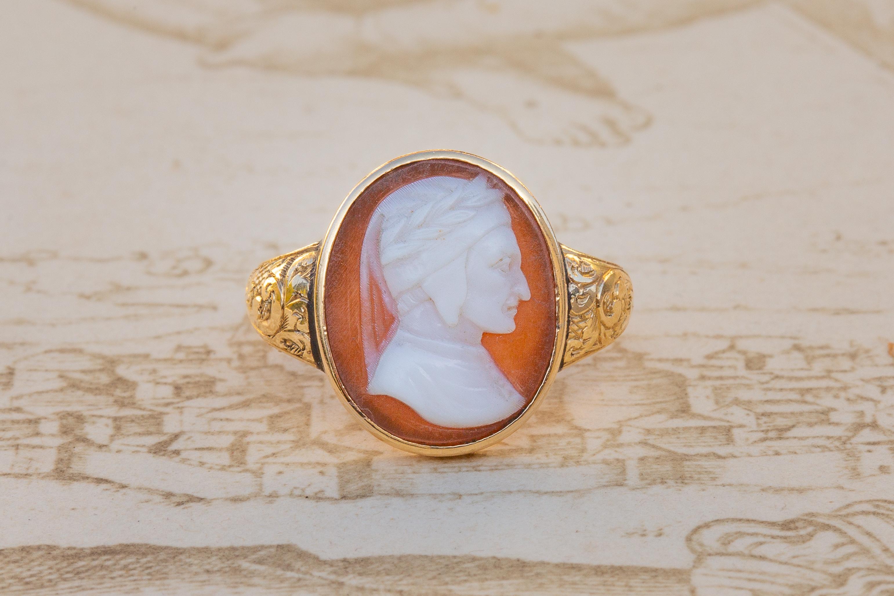 An excellent antique Italian cameo dating to the second half of the 19th century, circa 1865. The finely carved shell cameo depicts the profile head of ‘Il Sommo Poeta', the supreme poet, Dante Alighieri. 

An example with the same carving of Dante