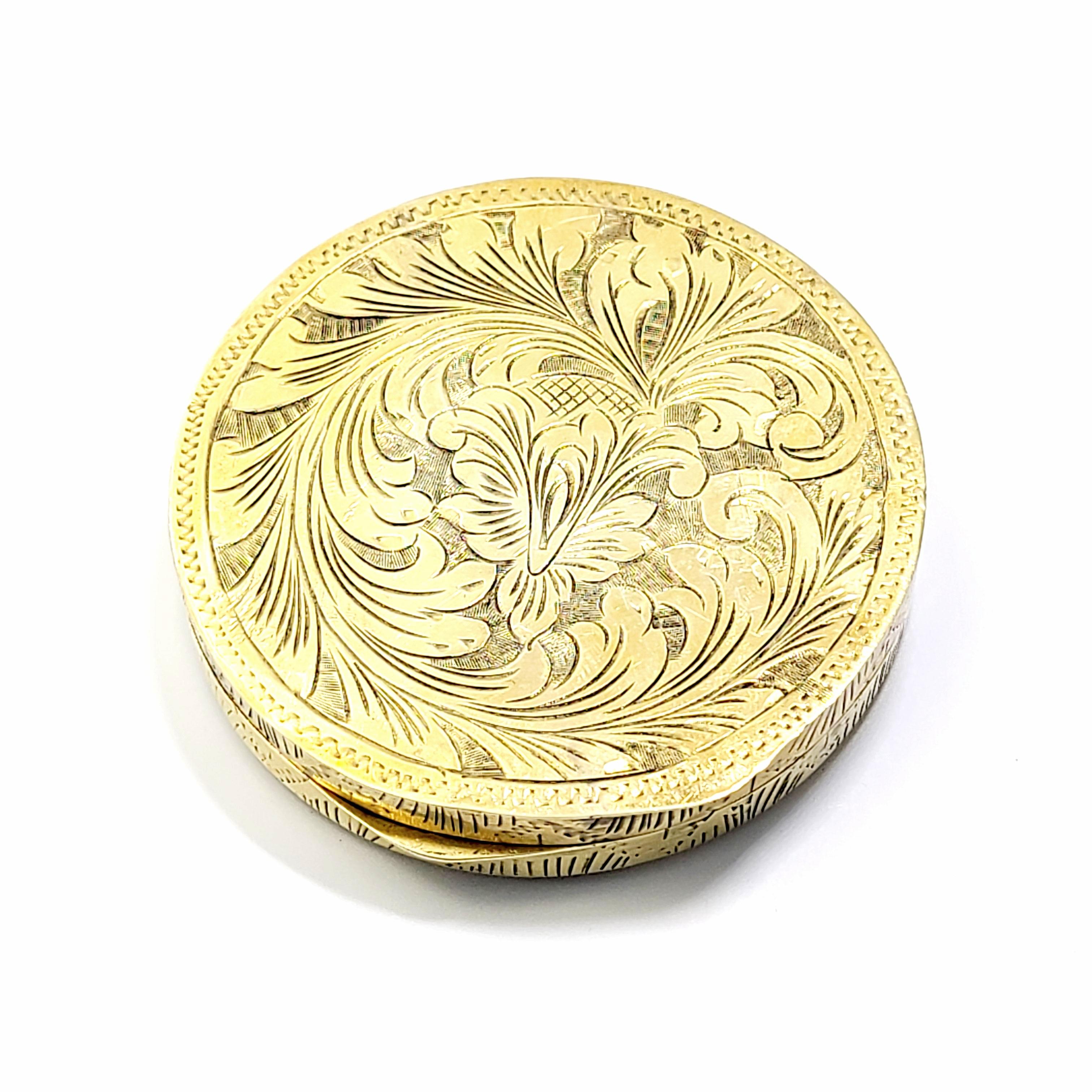 Antique Italian 800 silver with gold vermeil and hand painted enamel compact.

This round compact features beautiful gold vermeil over 800 silver with an etched scroll design. Hand painted Italian lovers scene on one side, with painted faux lapis