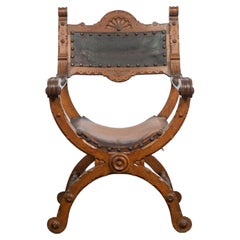 Antique Italian Armchair in Carved Wood and Leather