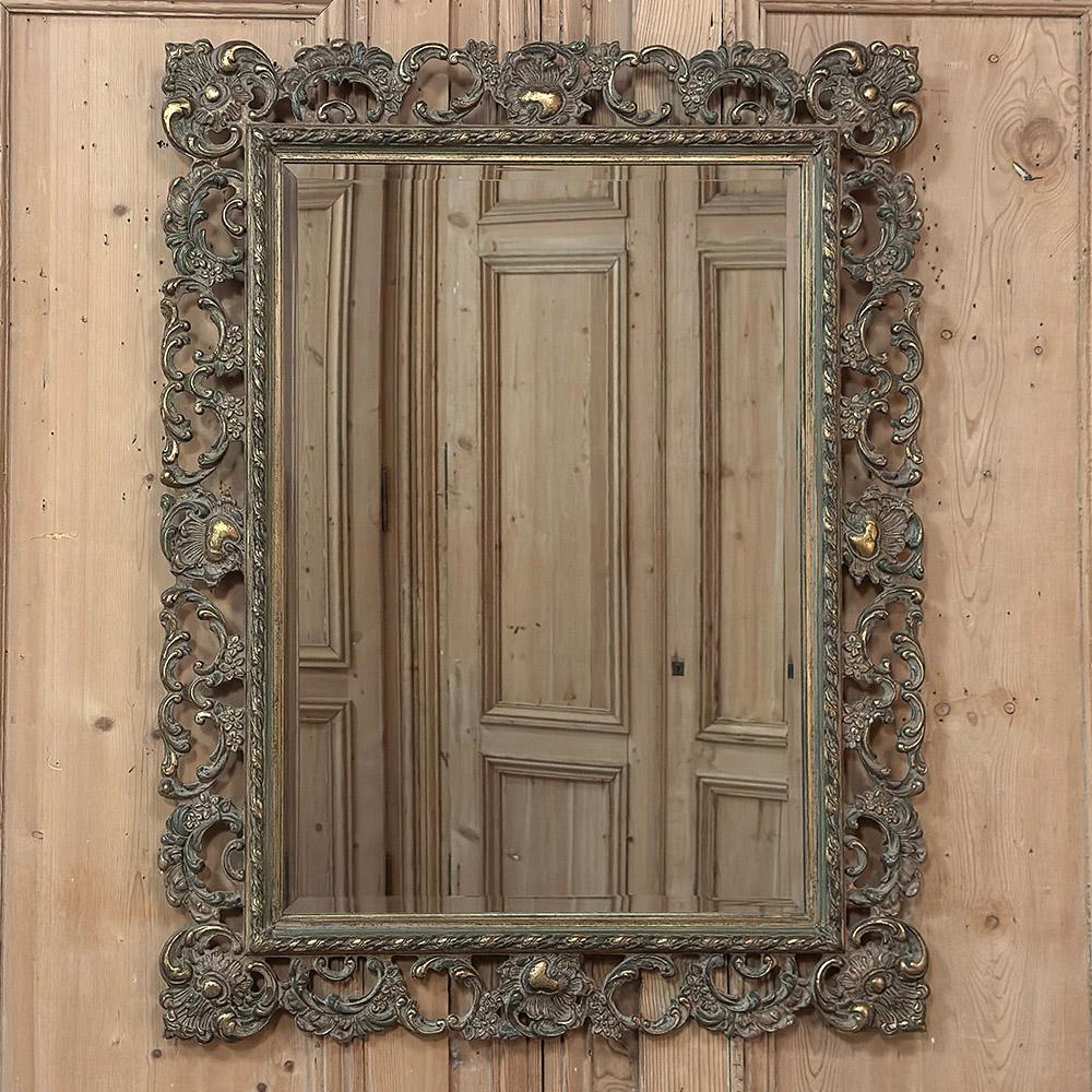 Beveled Antique Italian Baroque Carved Giltwood Wall Mirror For Sale