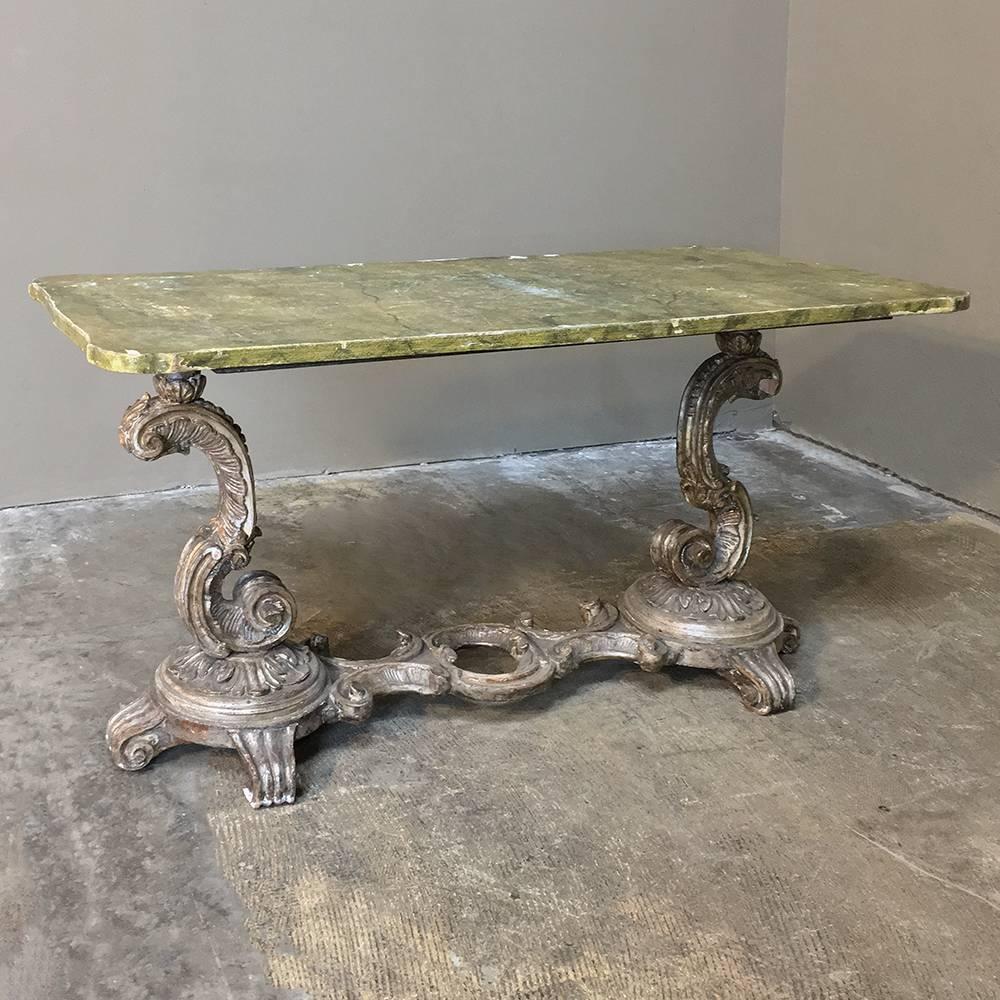 Antique Italian Baroque  Silvered Painted Coffee table will make a splendid style statement for your seating group, being expertly and artistically adorned with a faux-stone painted finish that is distressed just enough to make it work well with