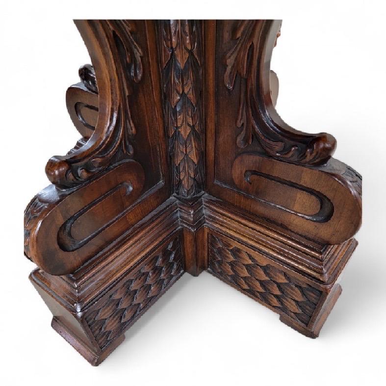 Antique Italian Baroque Style Finely Carved Ornate Mahogany Octagonal Center/Library Table

This exquisite antique Italian Baroque style octagonal center/library table showcases fine craftsmanship with its intricately carved mahogany structure. The