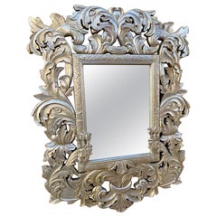 Antique miroir mural sculpté de style baroque italien