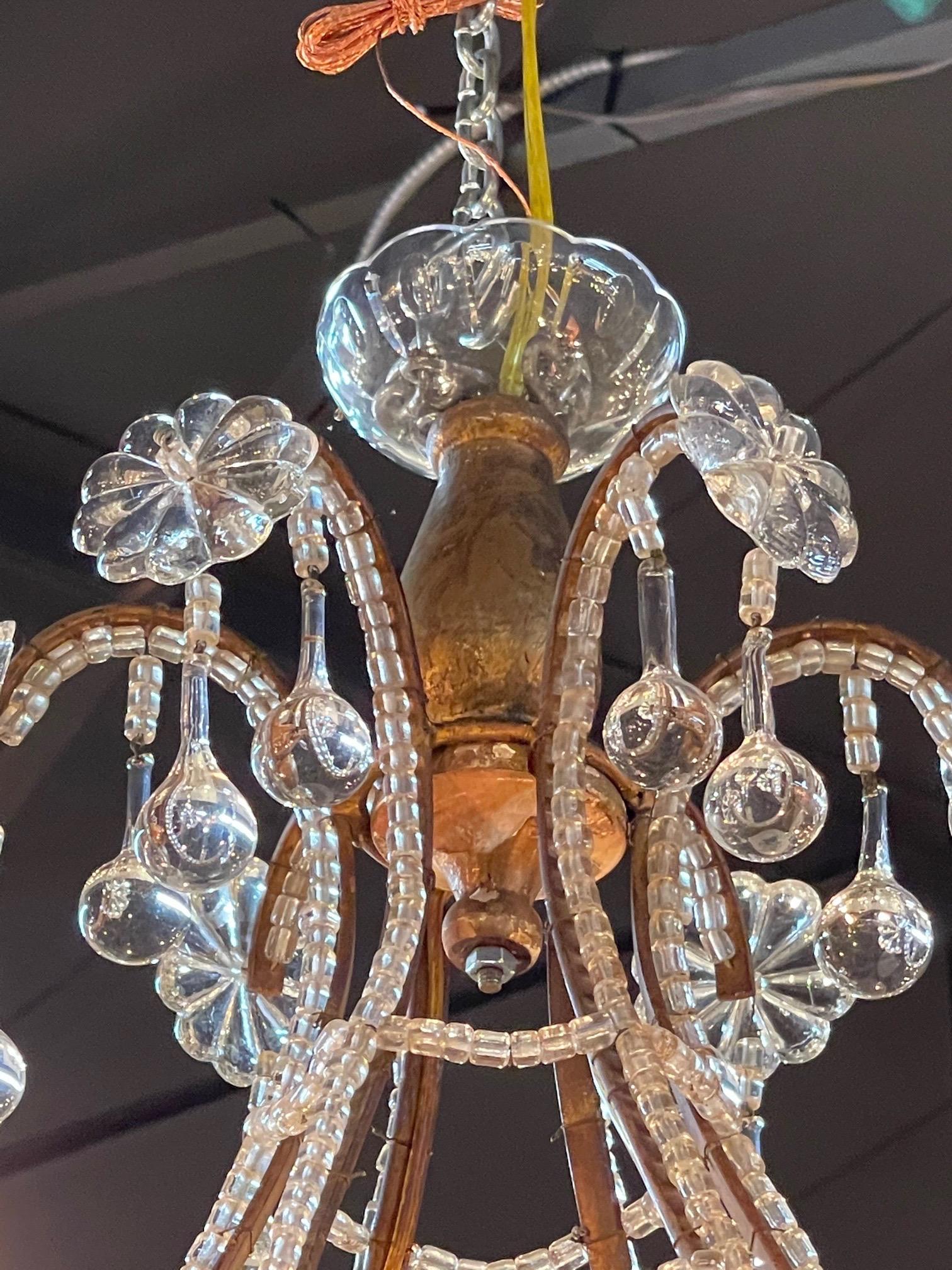 Amazing antique Italian beaded crystal 6-light chandeliers. Beautiful curved shape on the base which is covered in beads and glass drops. So pretty!! Note: Price listed is per item.