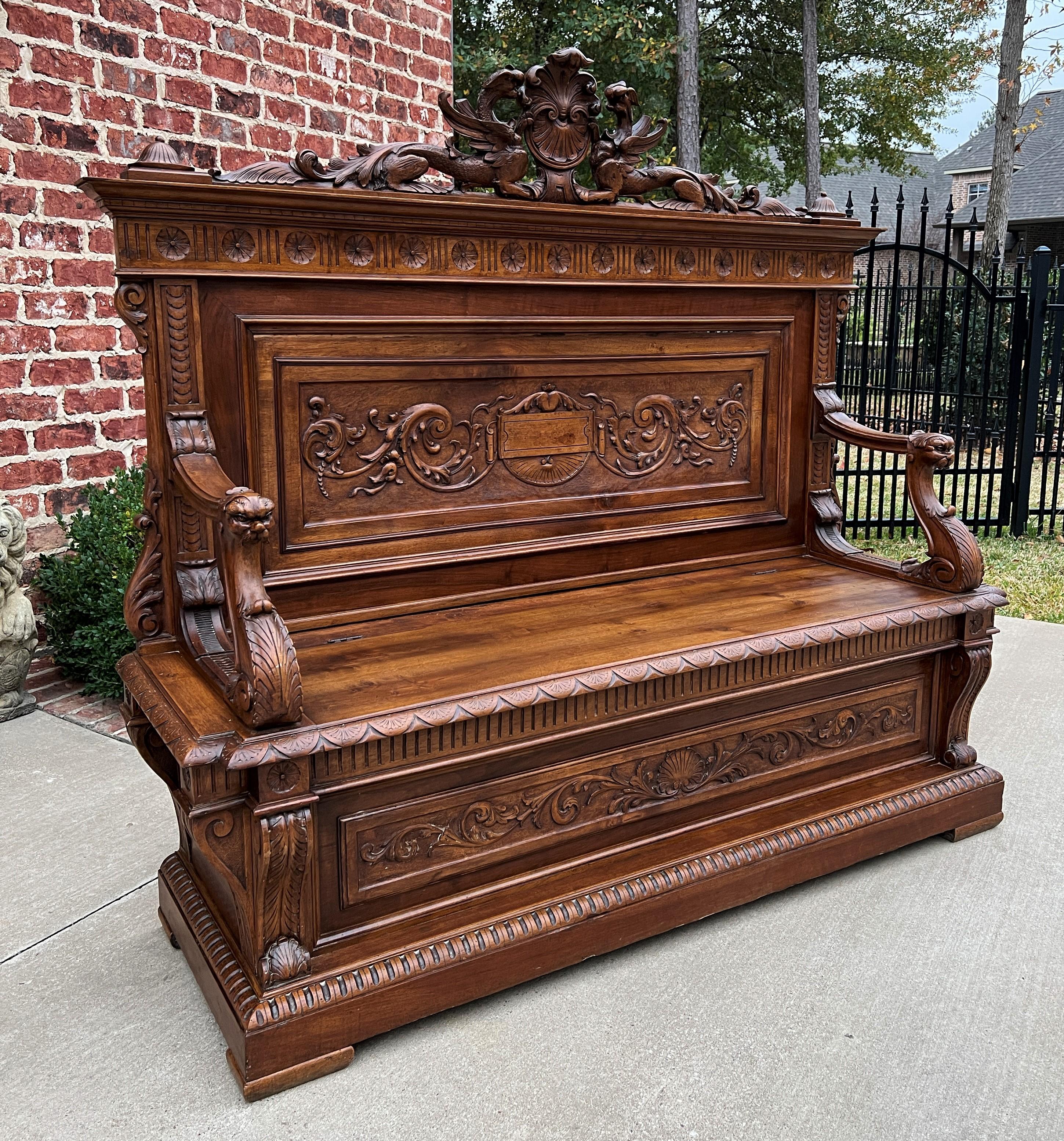Beautiful carved walnut antique Italian Renaissance revival bench or settee with lift top seat~~c. 1880s.

 HIGHLY CARVED~~these benches are always in high demand.

Versatile piece with so many functions~~use as a traditional entry or hall