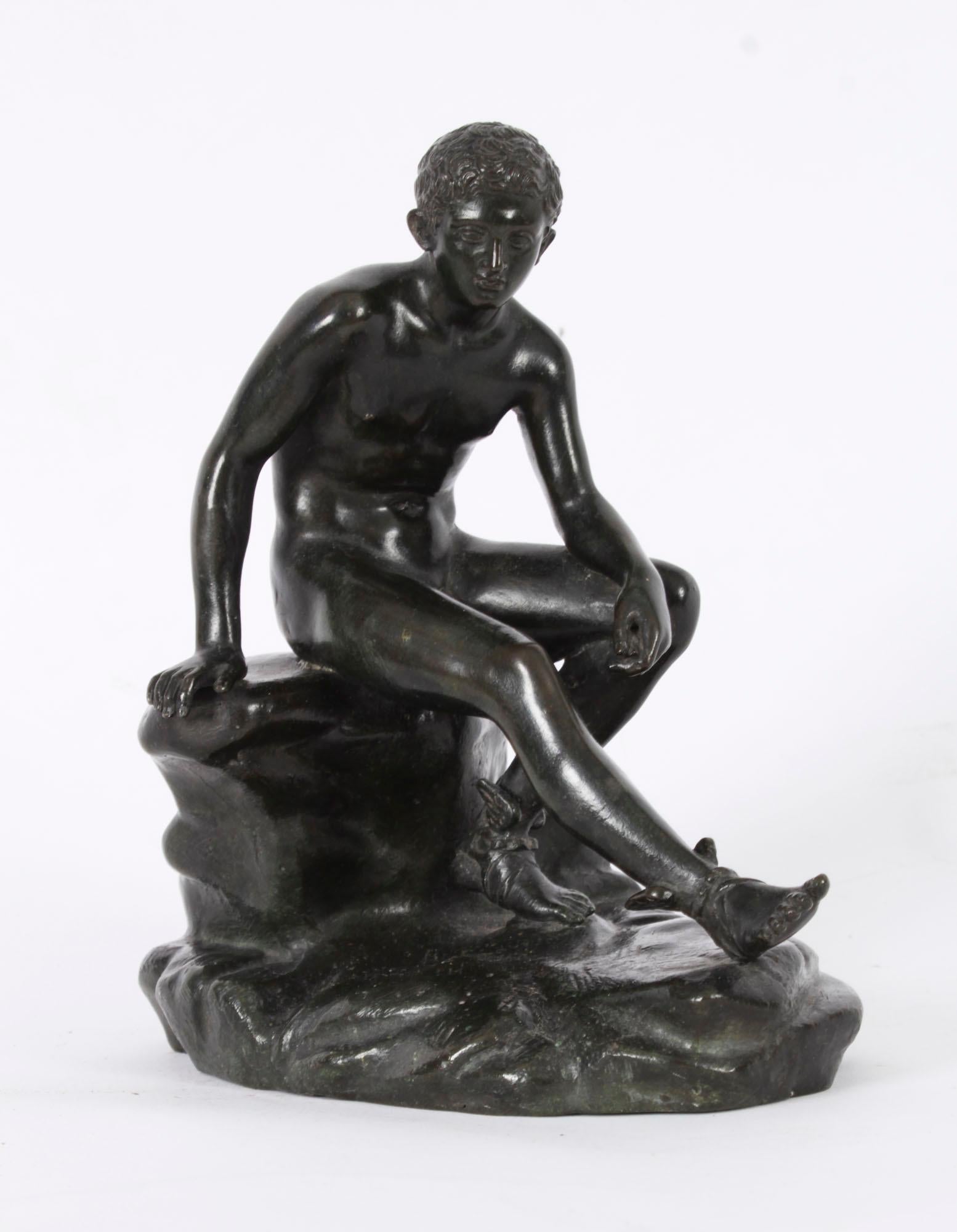 This is a beautifully detailed antique Italian Grand Tour bronze sculpture of Hermes, dating from Circa 1880.

Hermes is cast after the original held at the Museo Nazionale in Naples and is depicted naked seated on a naturalistic rock base, his