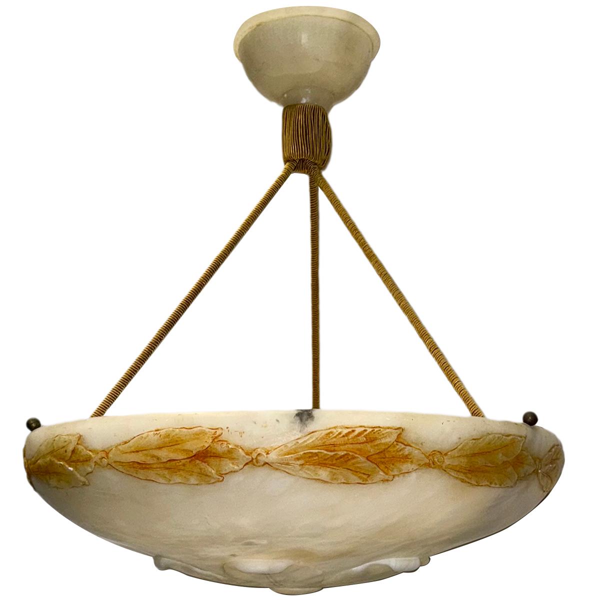 A circa 1920 Italian carved alabaster ligth with 3 edison lights.

Measurements:
Diameter: 20