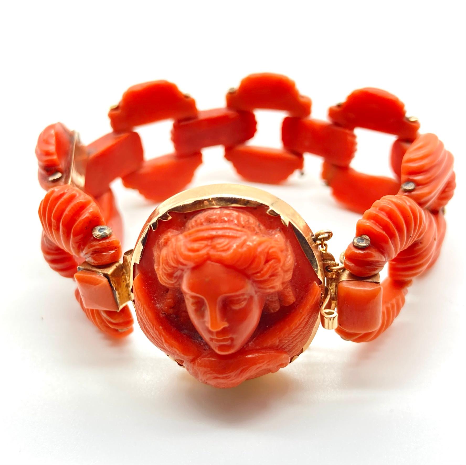 A beautiful carved coral bracelet centering a profile of a lady. Made in Naples, circa 1820.