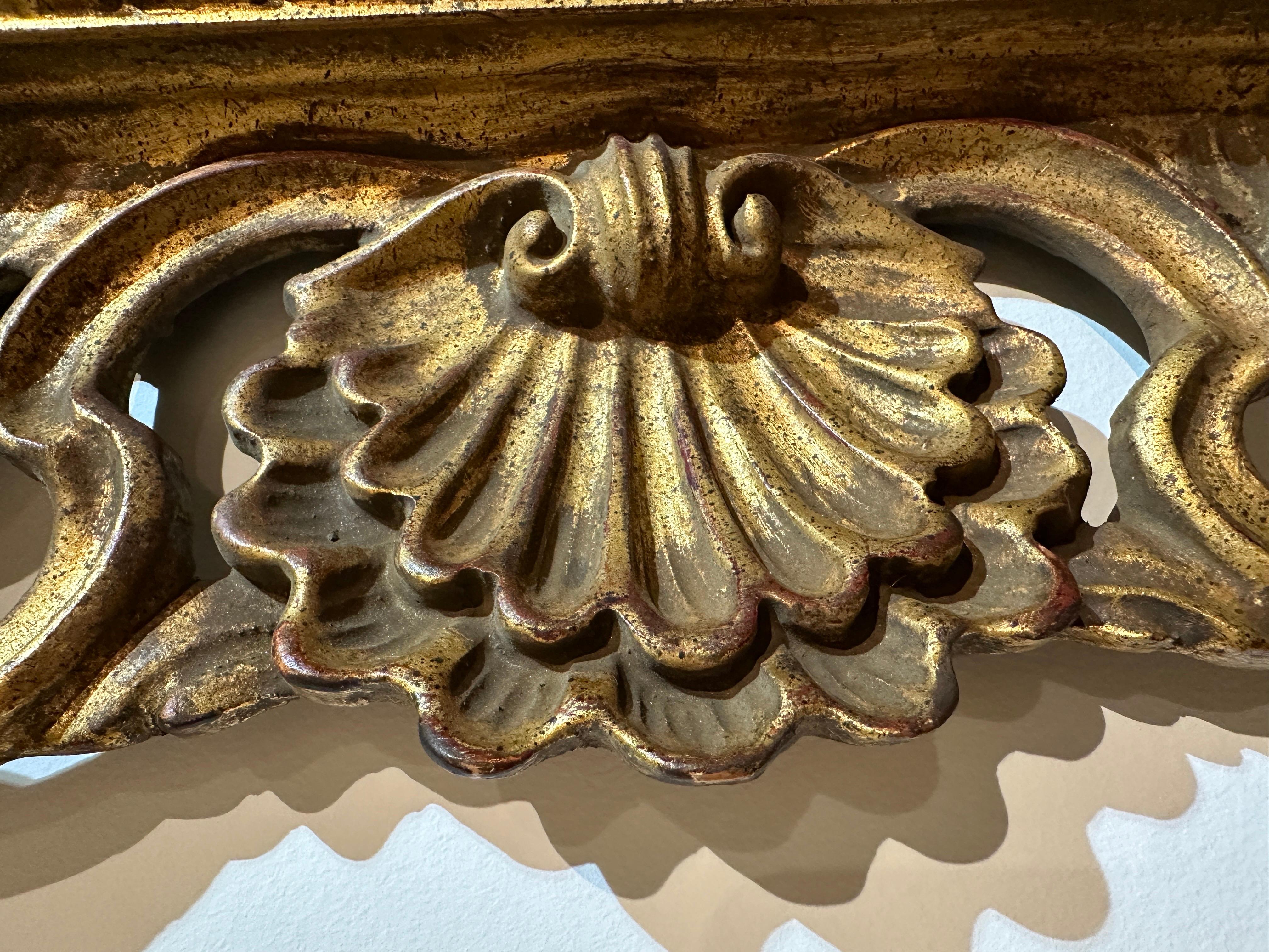 Baroque Revival Antique Italian Carved Giltwood Frame and Antiqued Glass Wall Mirror For Sale