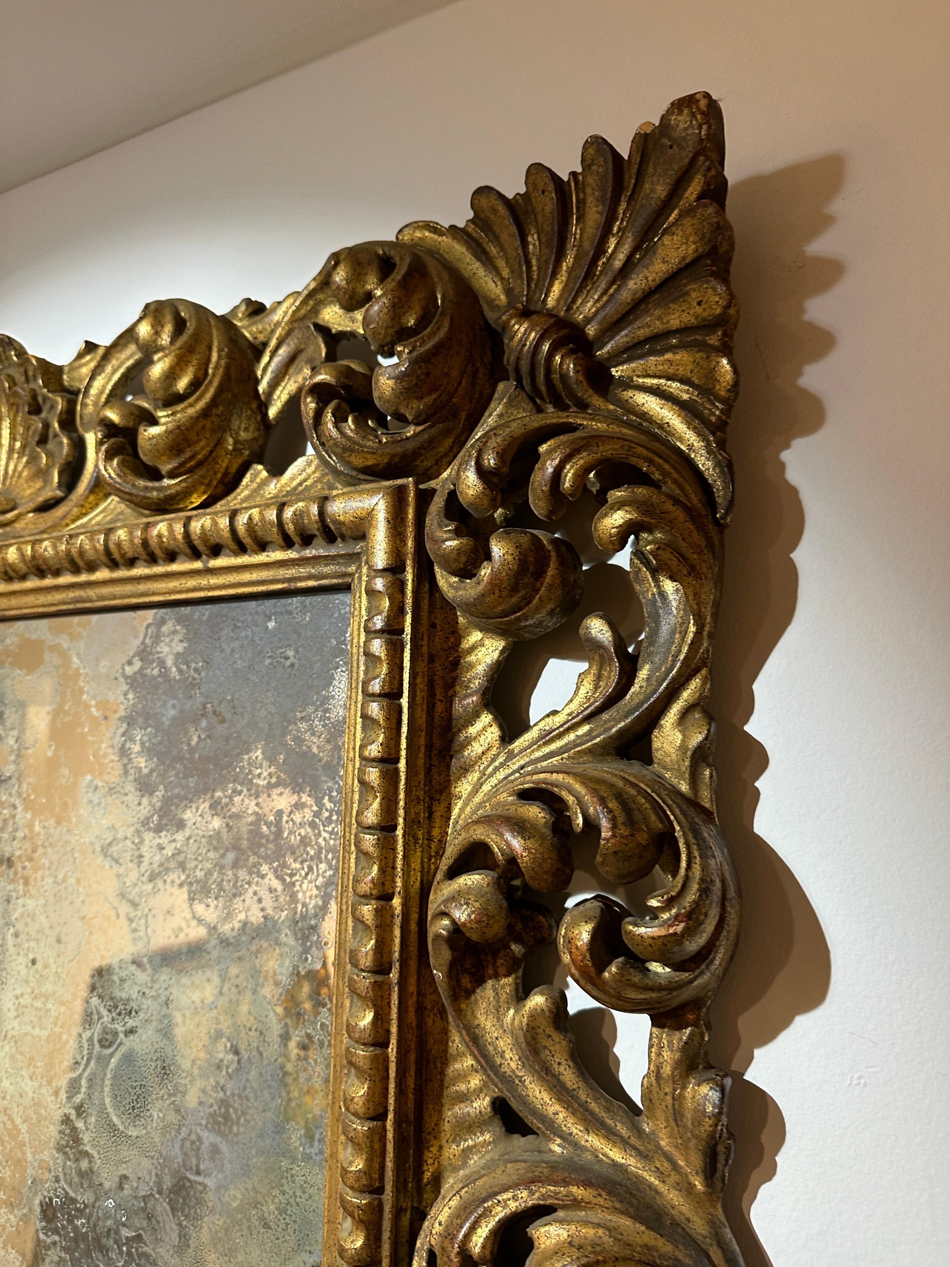 Antique Italian Carved Giltwood Frame and Antiqued Glass Wall Mirror For Sale 4