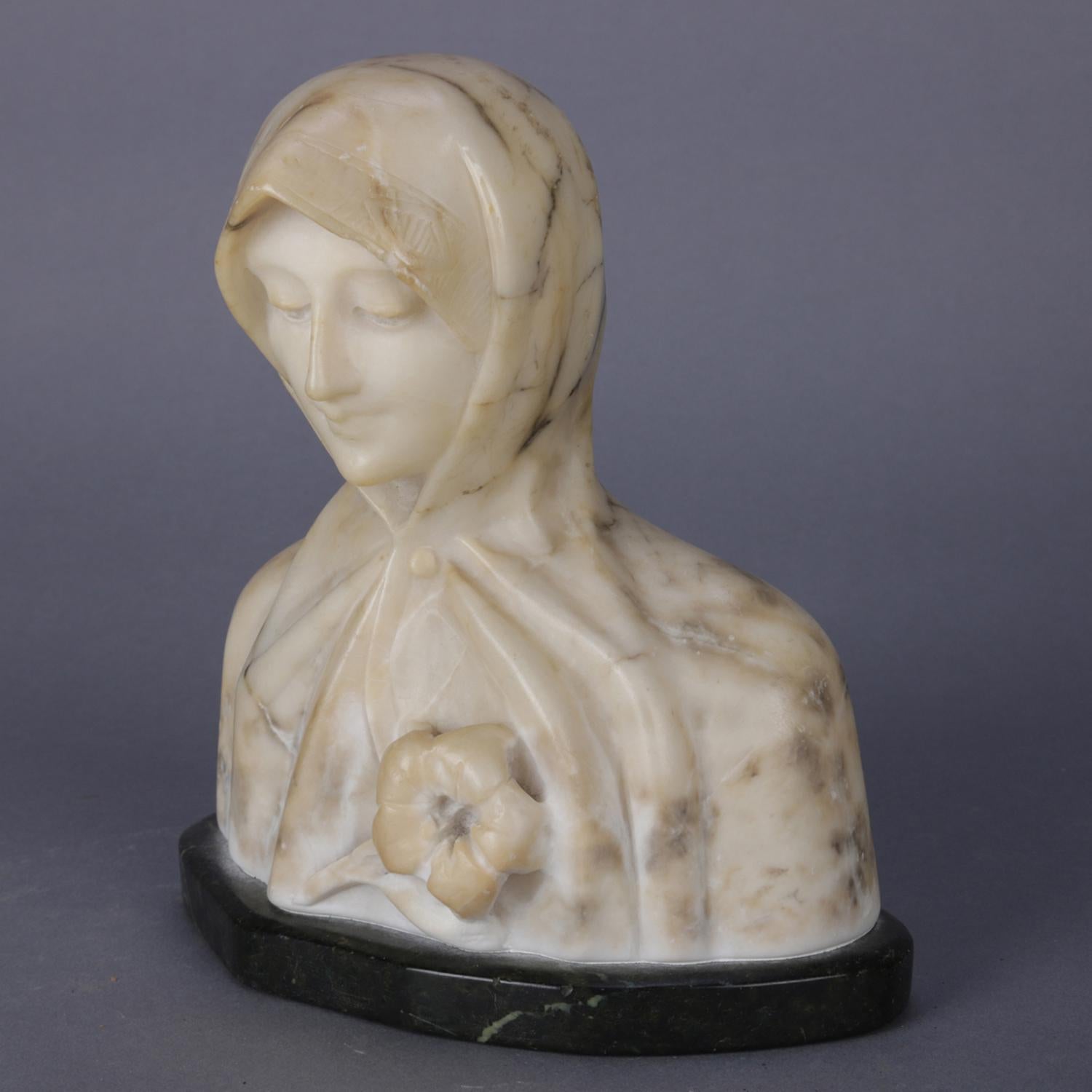 An antique Italian carved marble portrait bust sculpture depicts Mary, Mother of Jesus Christ, marble with deeply contrasting veining, circa 1900

Measures: 8.25