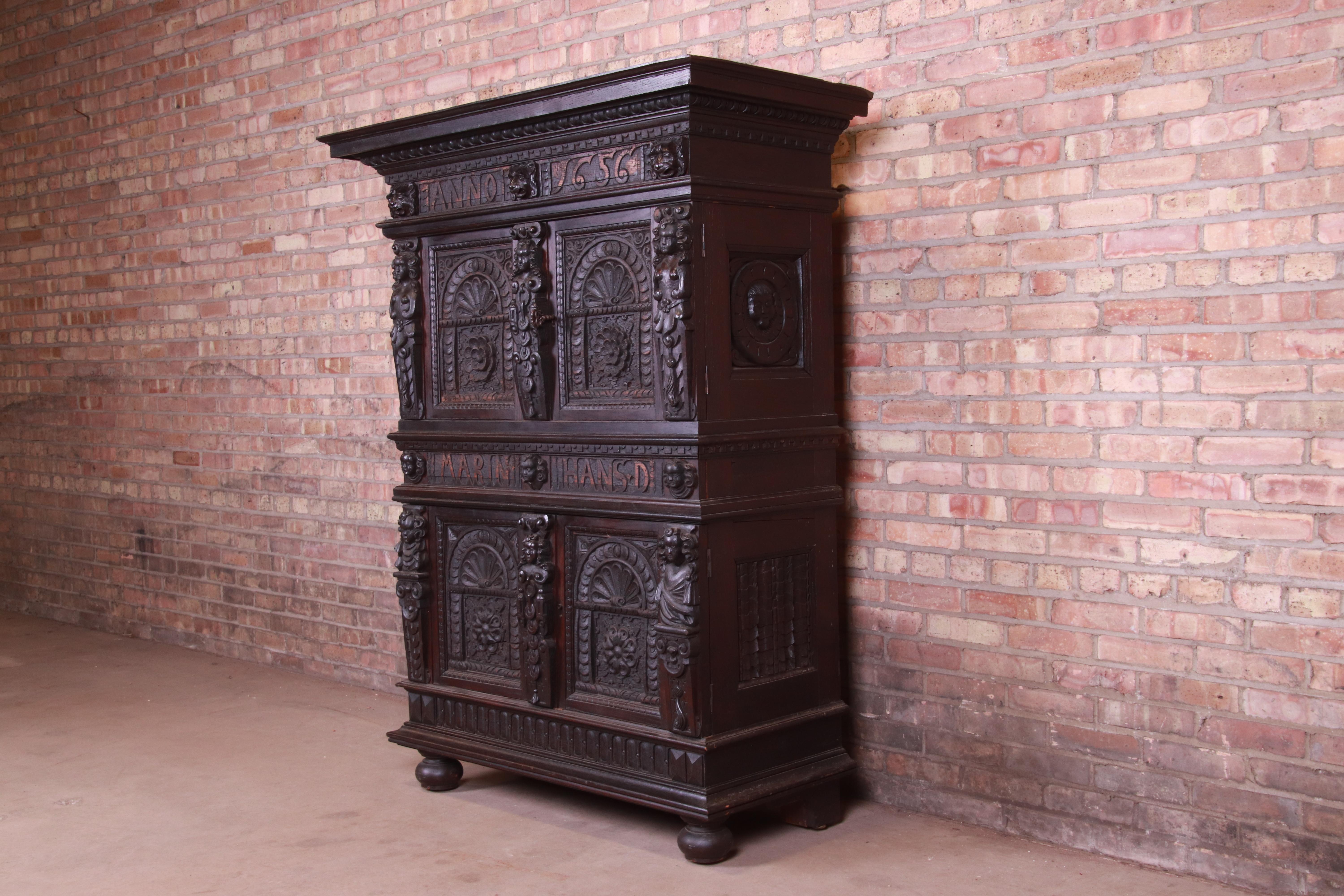 An exceptional 19th century Italian Renaissance Revival ornate carved oak cupboard or bar cabinet

Italy, circa 1880s

Measures: 49.75