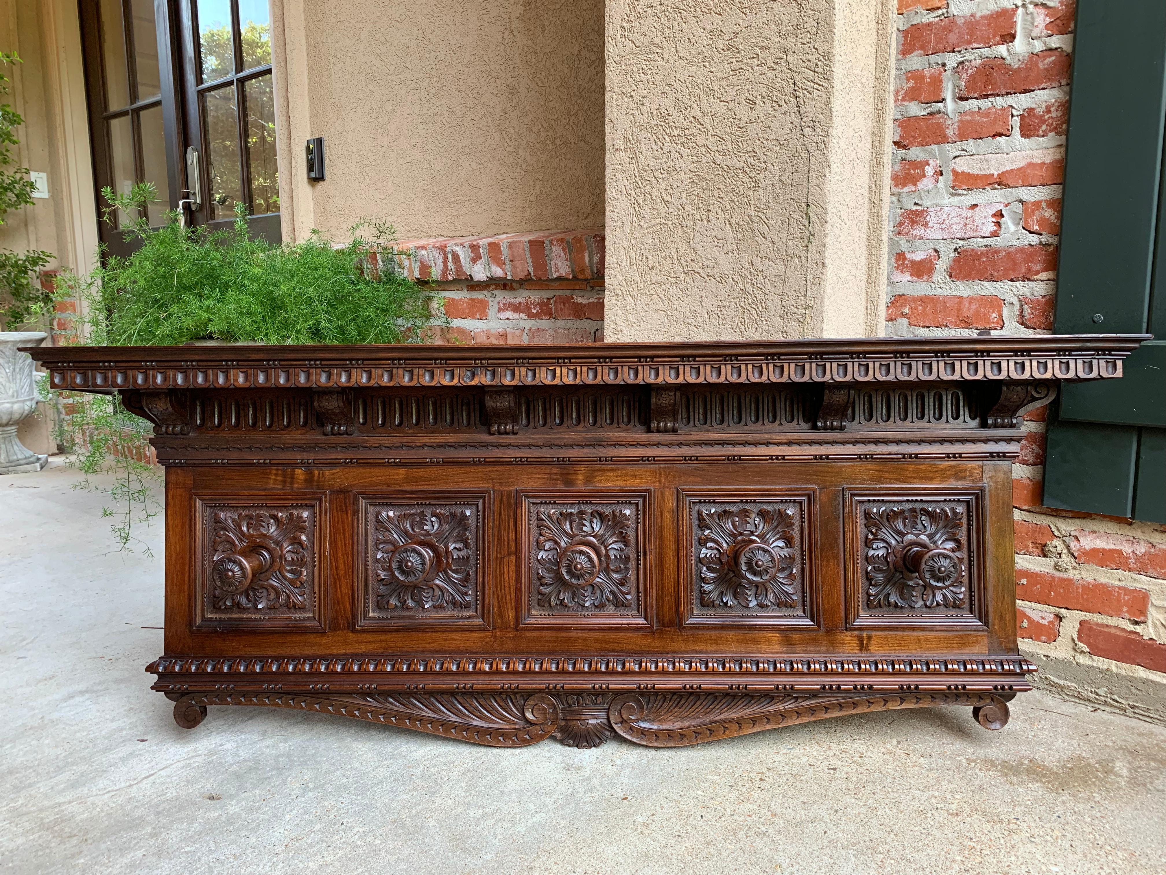 Direct from Italy, an ornately carved oak Italian Renaissance Revival wall shelf~
(One of two from our most recent container)
~FIVE carved wood posts for hanging hats, coats, etc~
~This would also be beautiful as a carved panel to hang above a
