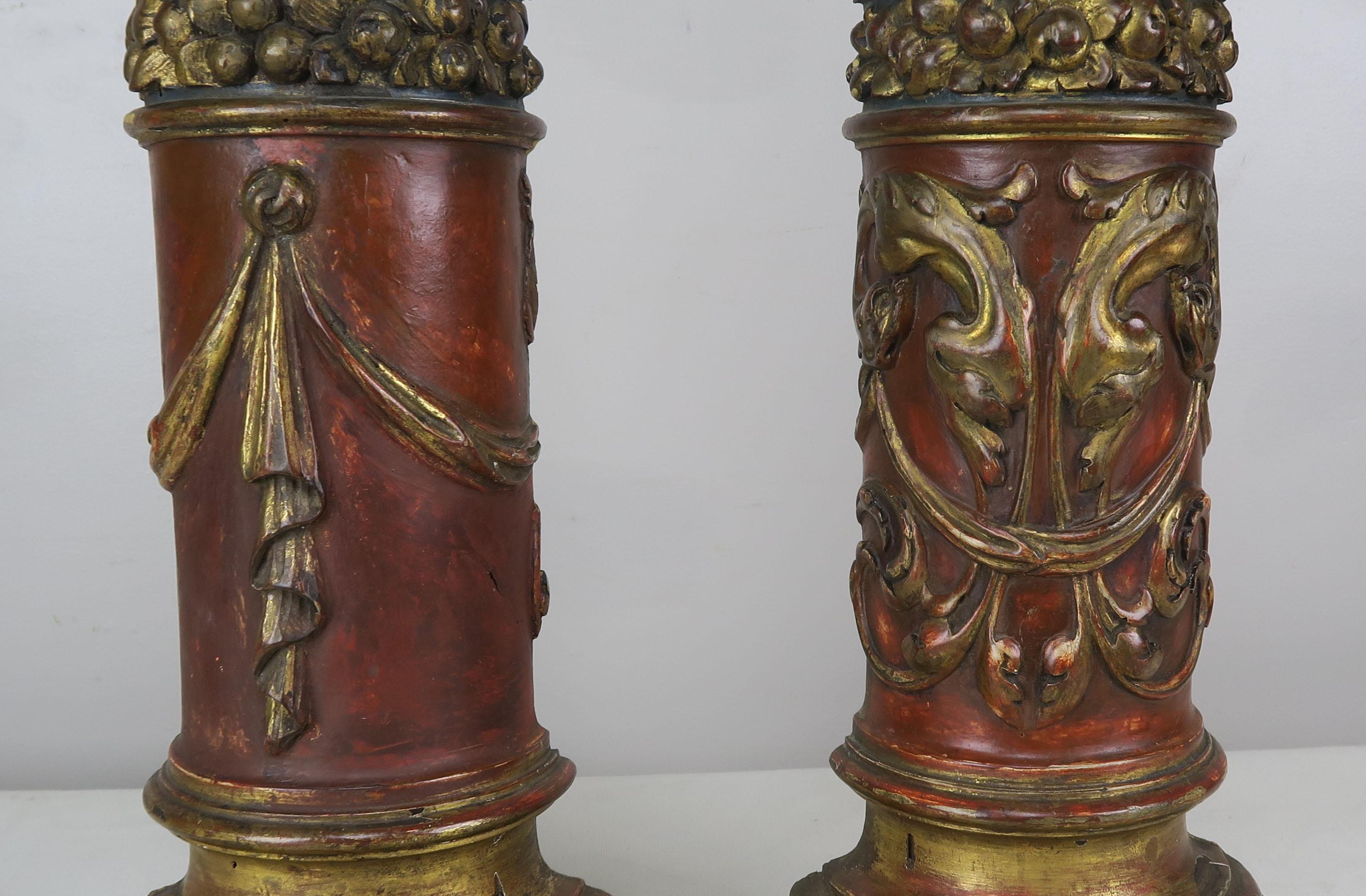 Pair of custom one-of-a-kind carved wood Italian painted fragments made into lamps and crowned with hand painted parchment shades.