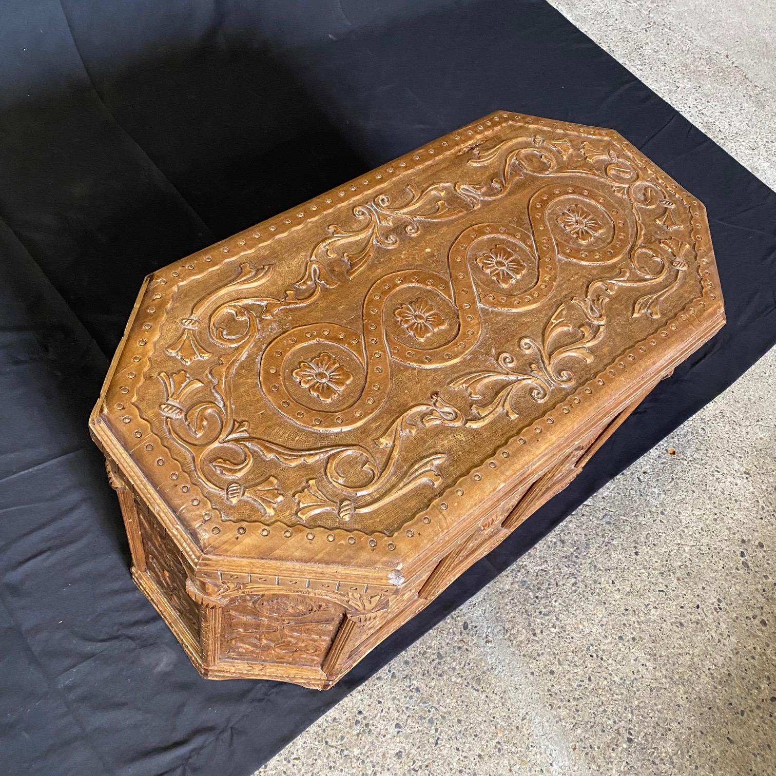 Antique European, likely Italian, sarcophagus shaped coffer, trunk or blanket chest that would also make a stunning coffee table. Could also be wonderful for lining storage in a bedroom at the foot of a bed. A wonderfully hand carved “coffer”, “mule