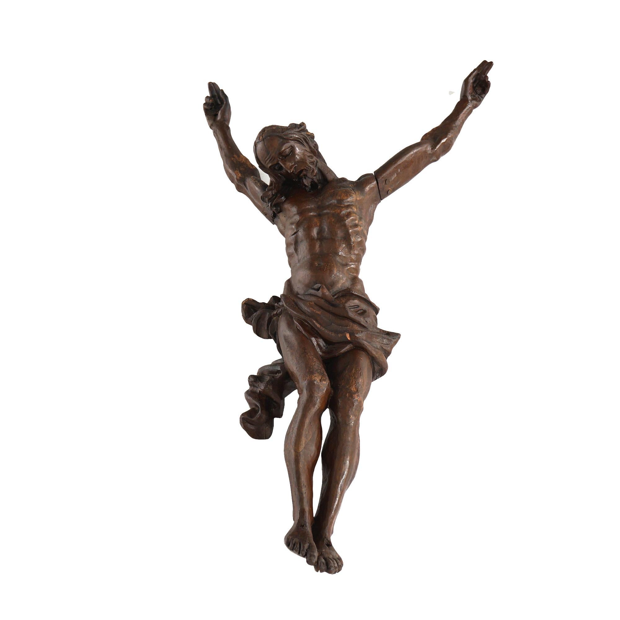 An antique Italian wall sculpture offers hand carved and stained oak statue of the crucified Jesus Christ, 19th century

Measures - 36