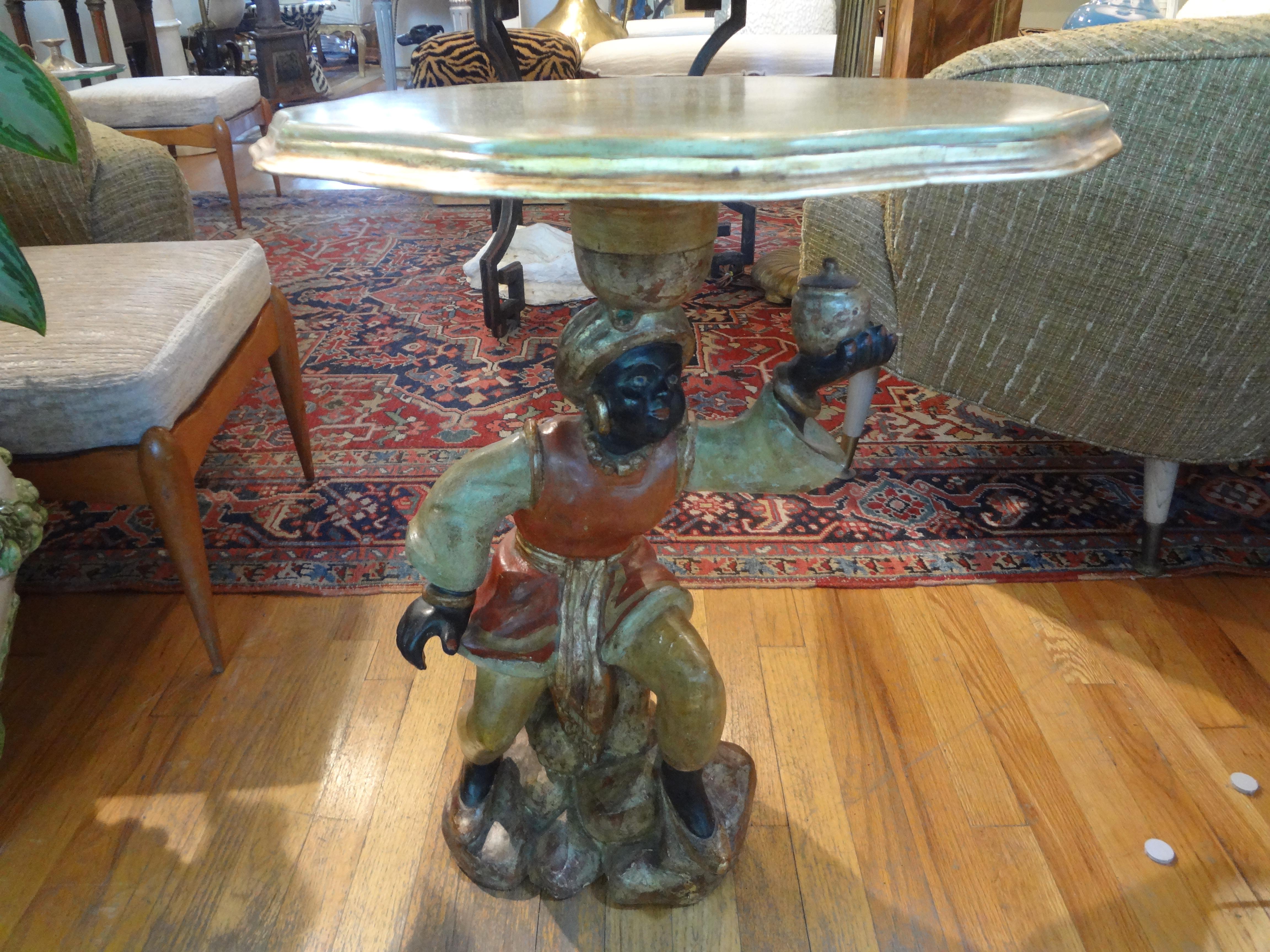 Lovely antique Italian polychromed carved wood Orientalist table. This unusual Italian side table or guéridon could be used in a variety of interiors. Our chic Italian table will add a bit of whimsey to your interior!