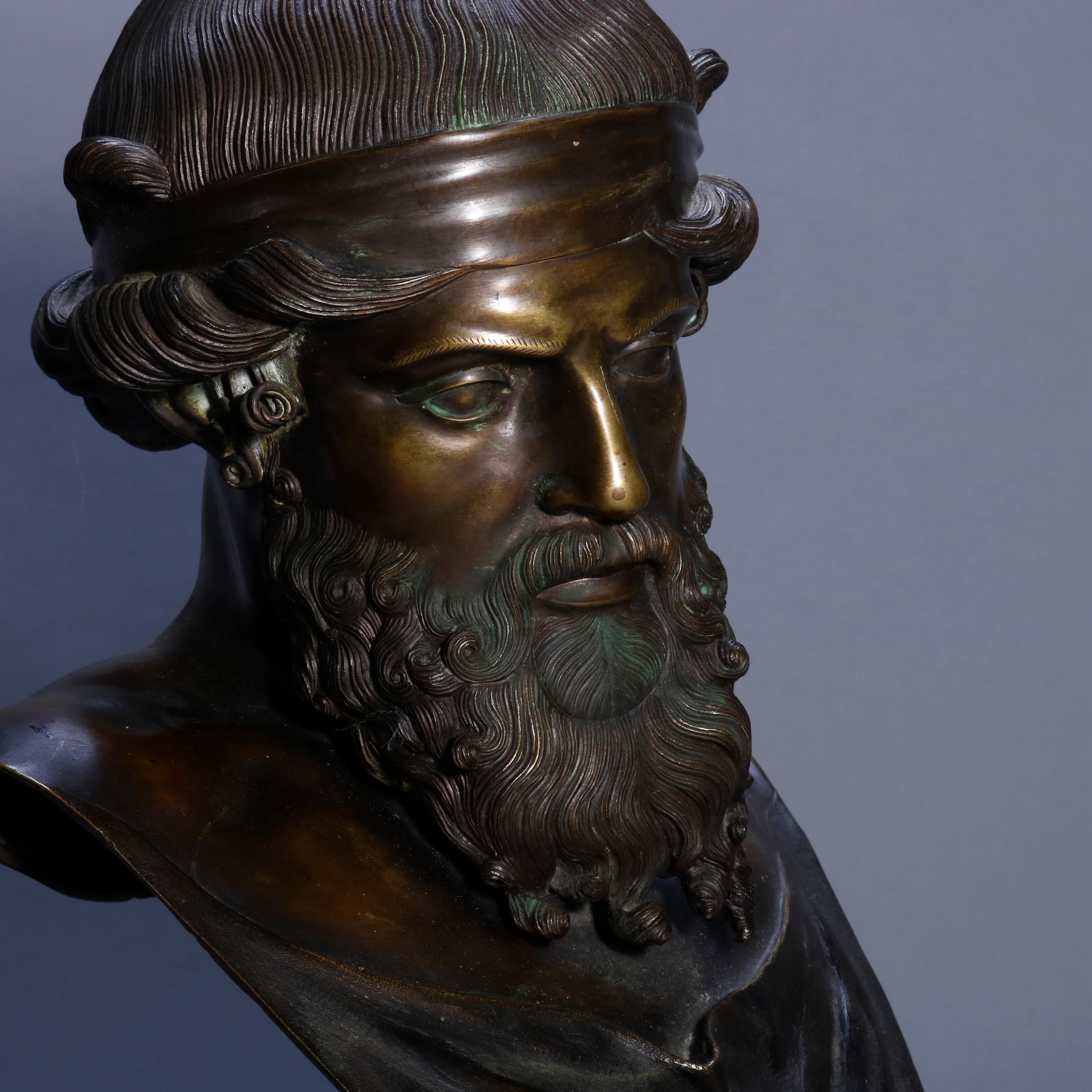 An antique Italian cast bronze portrait bust sculpture of Plato or more likely Dionysus (as portrayed in the first iconography of the god) after original displayed in the Naples Museum of Archaeology, mounted on ebonized wood plinth, circa